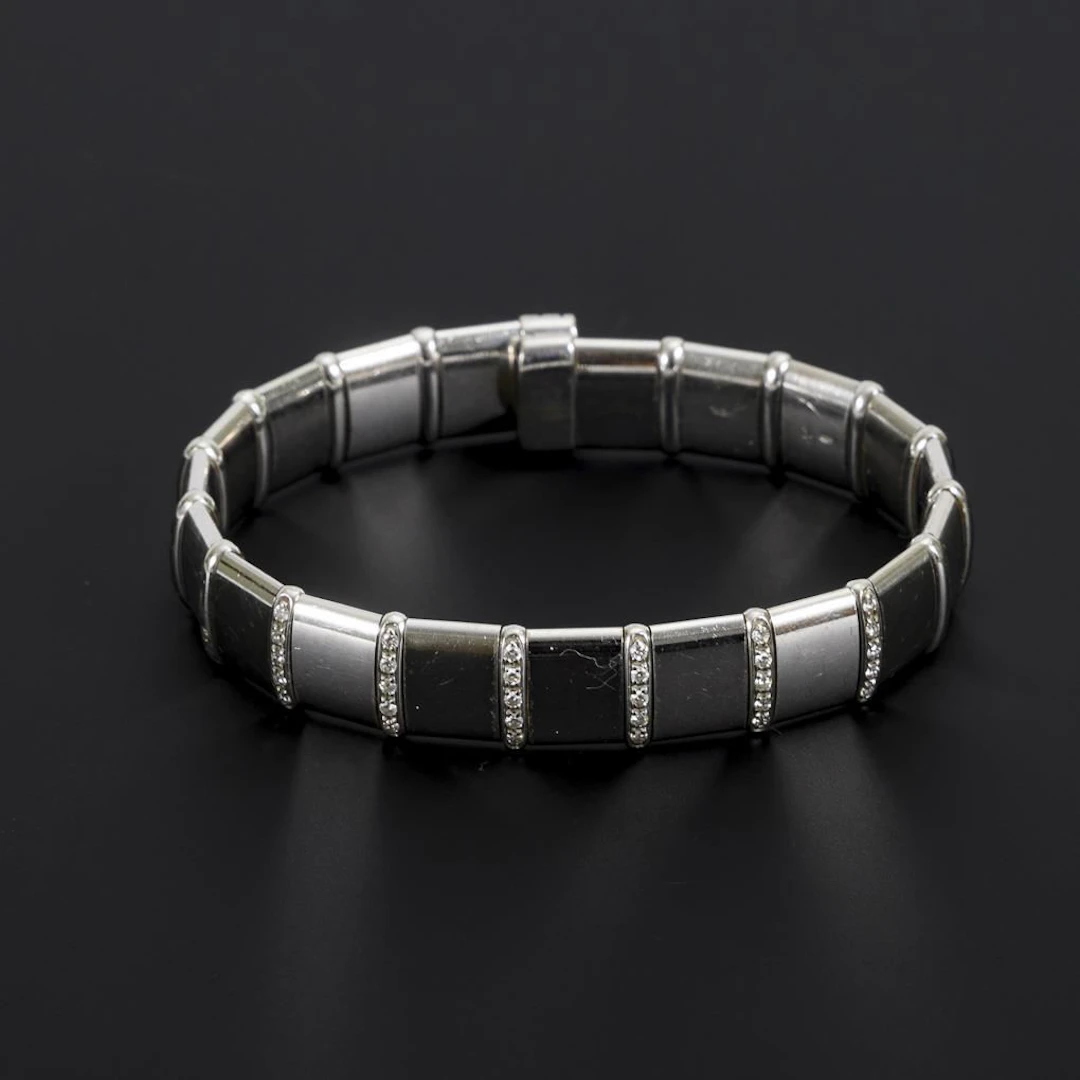 Bracelet with diamond-set bars.