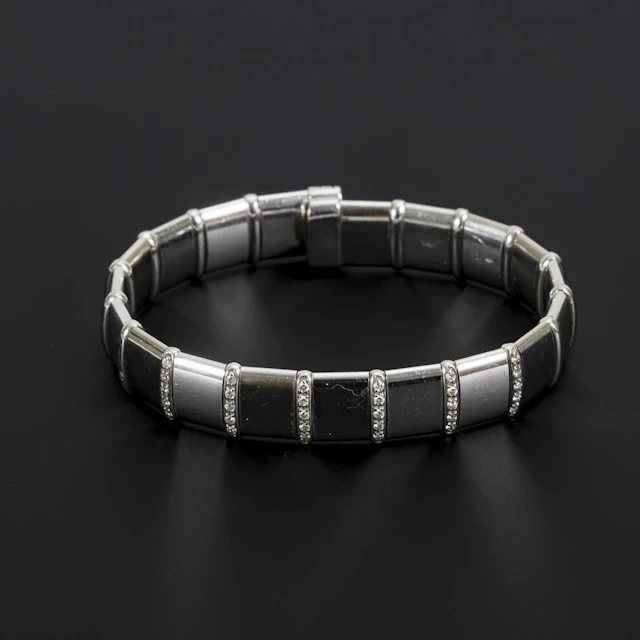 Bracelet with diamond-set bars.