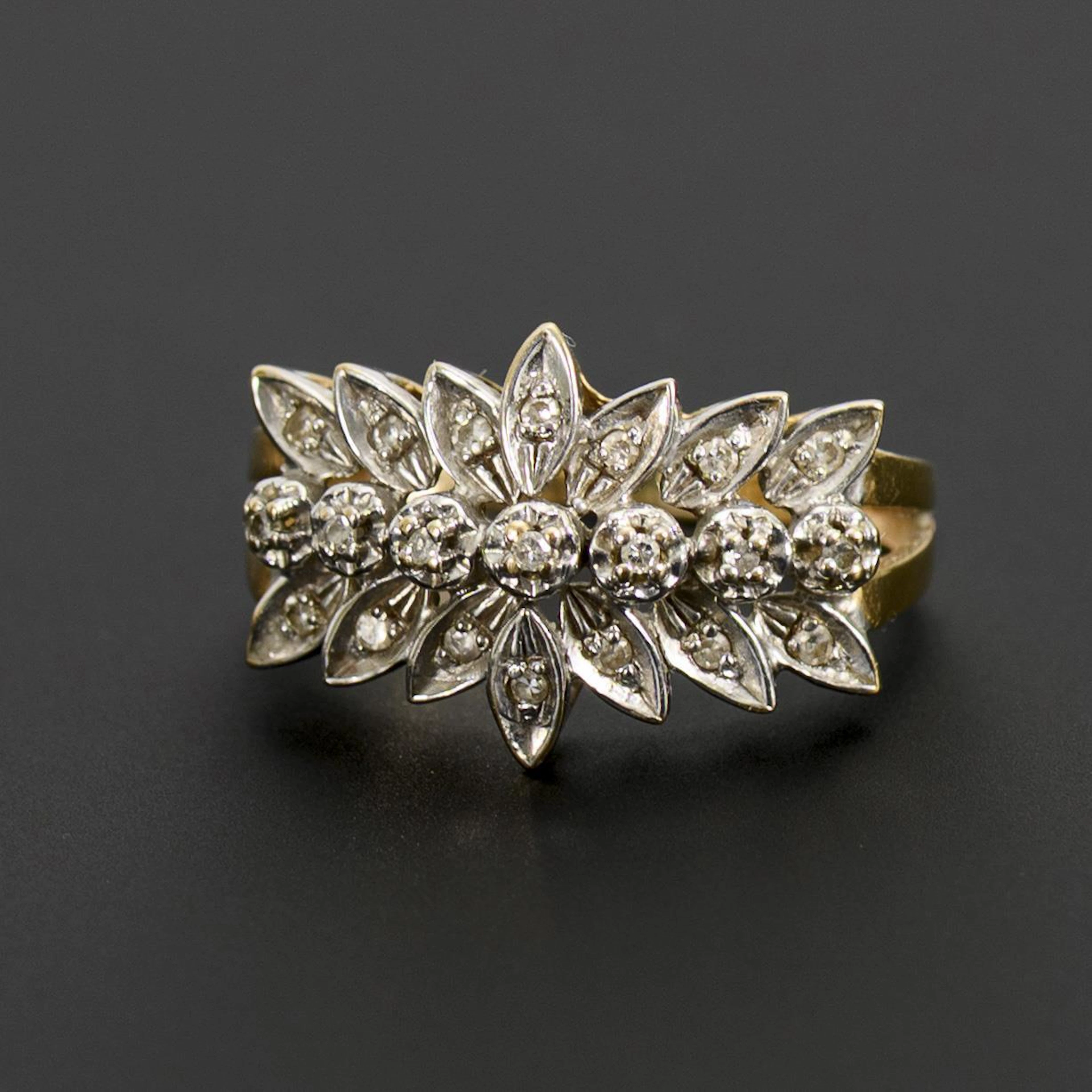 Historically designed ring with diamonds.