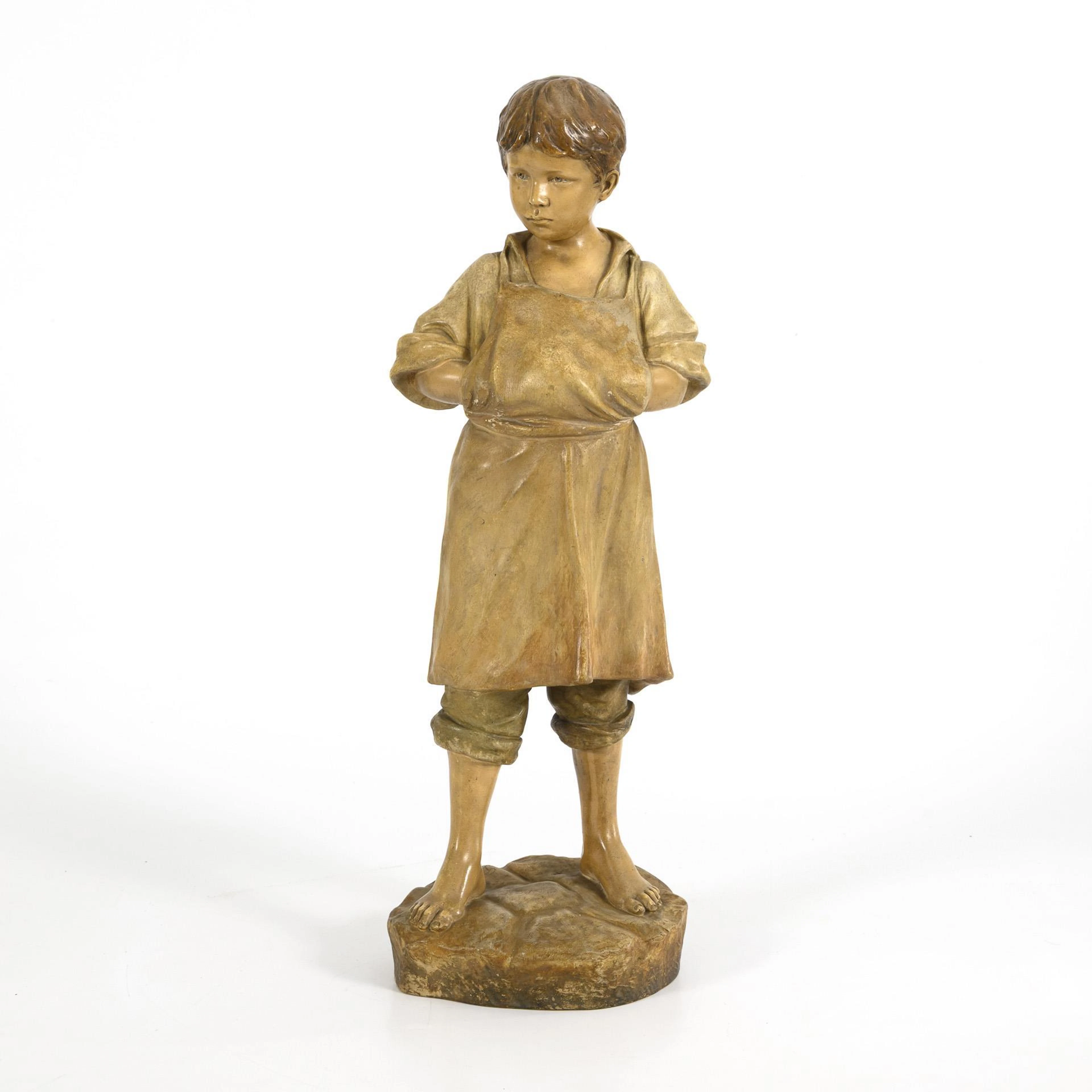 Art Nouveau terracotta figure "Shoemaker's Boy". Viennese manufactory