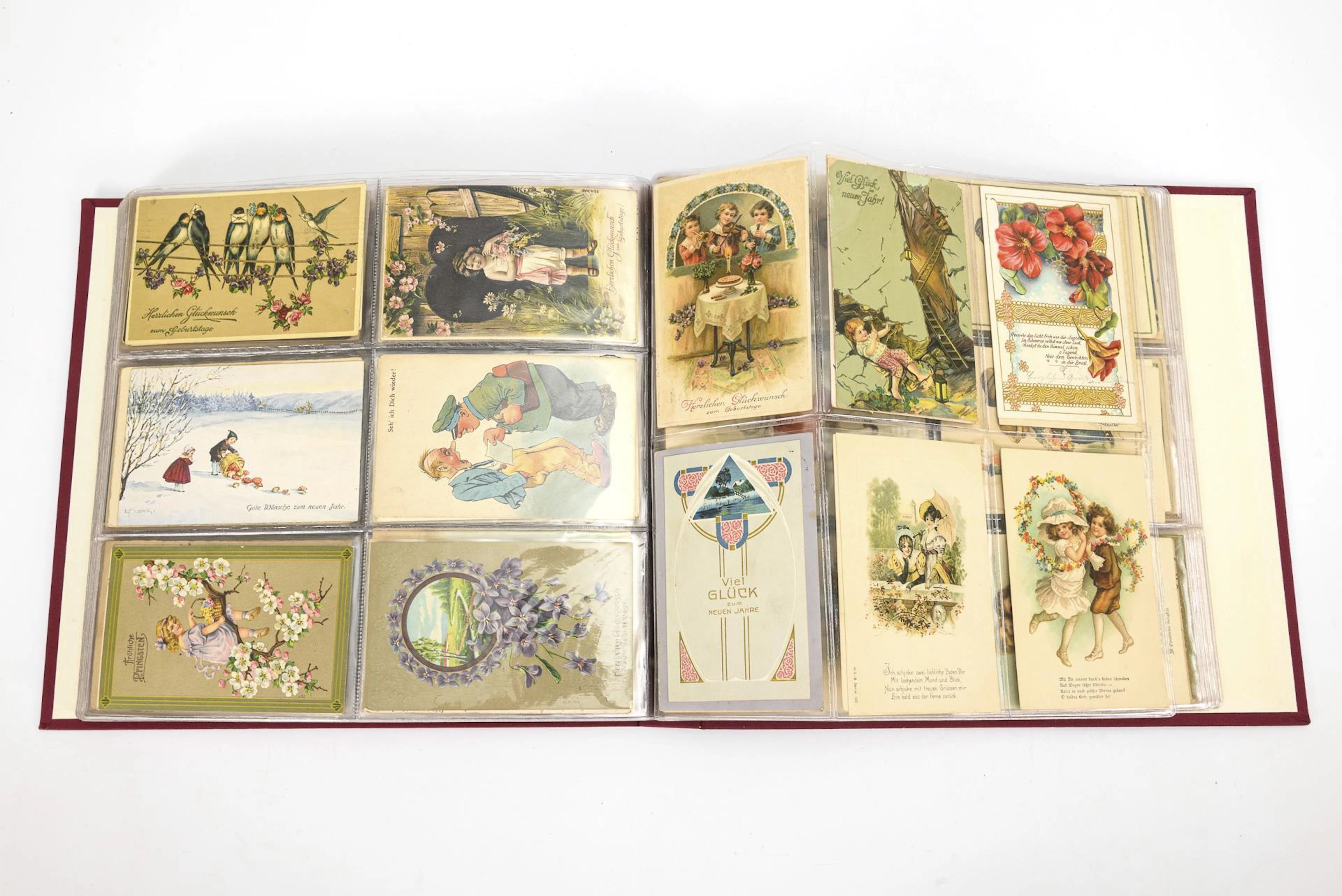 Postcard album with approx. 312 kitsch cards.