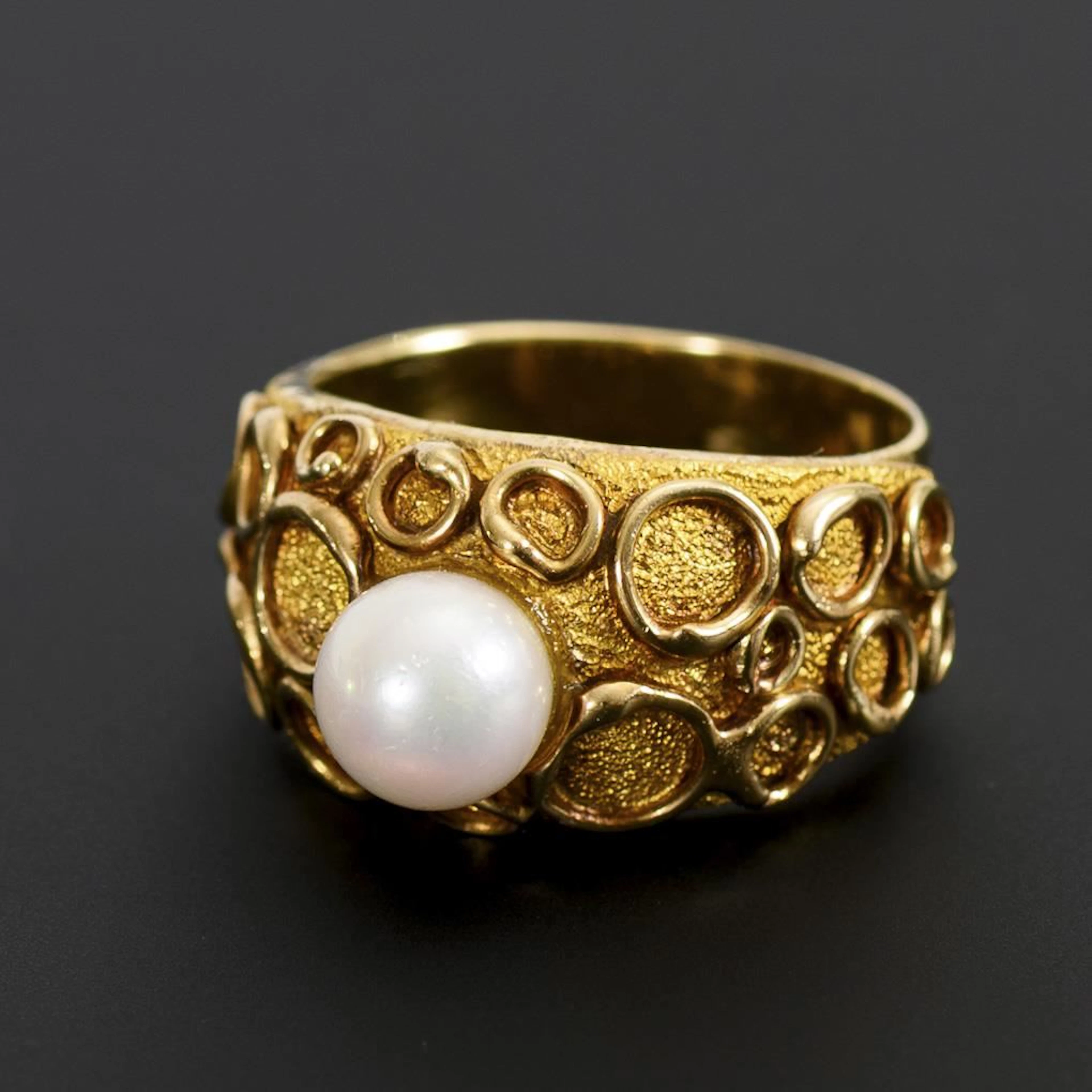 High-quality ring with a pearl.
