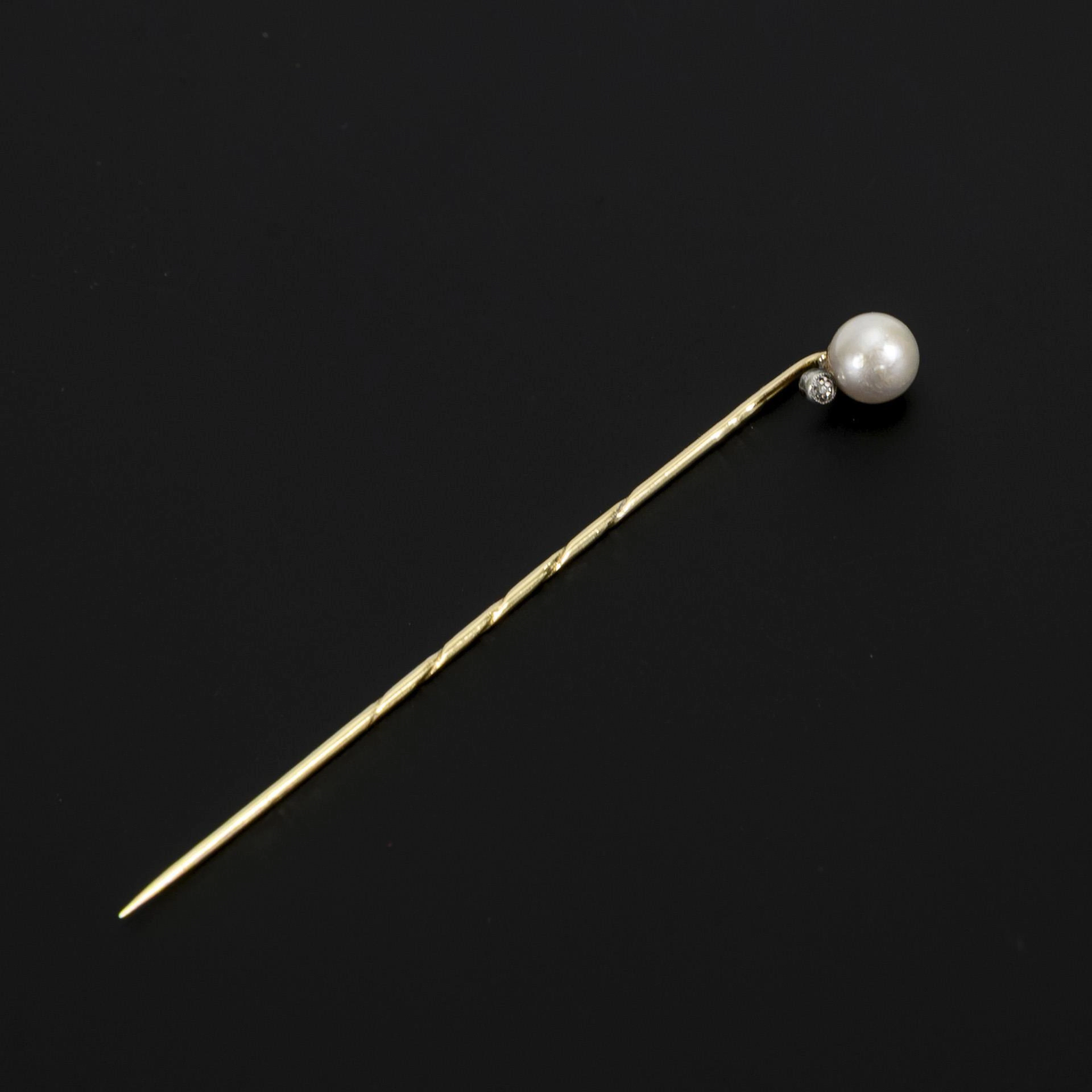 Pin with pearl and old-cut diamond.