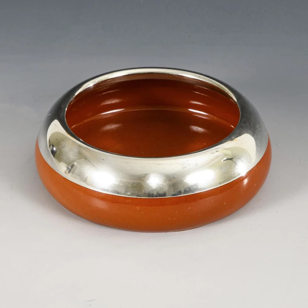 Round ashtray with silver mount. “Royal Majolica and Terracotta Workshop,”