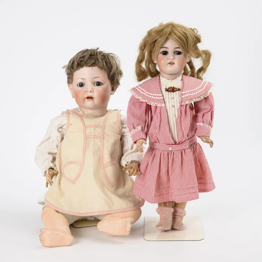 2 broken dolls for crafters.