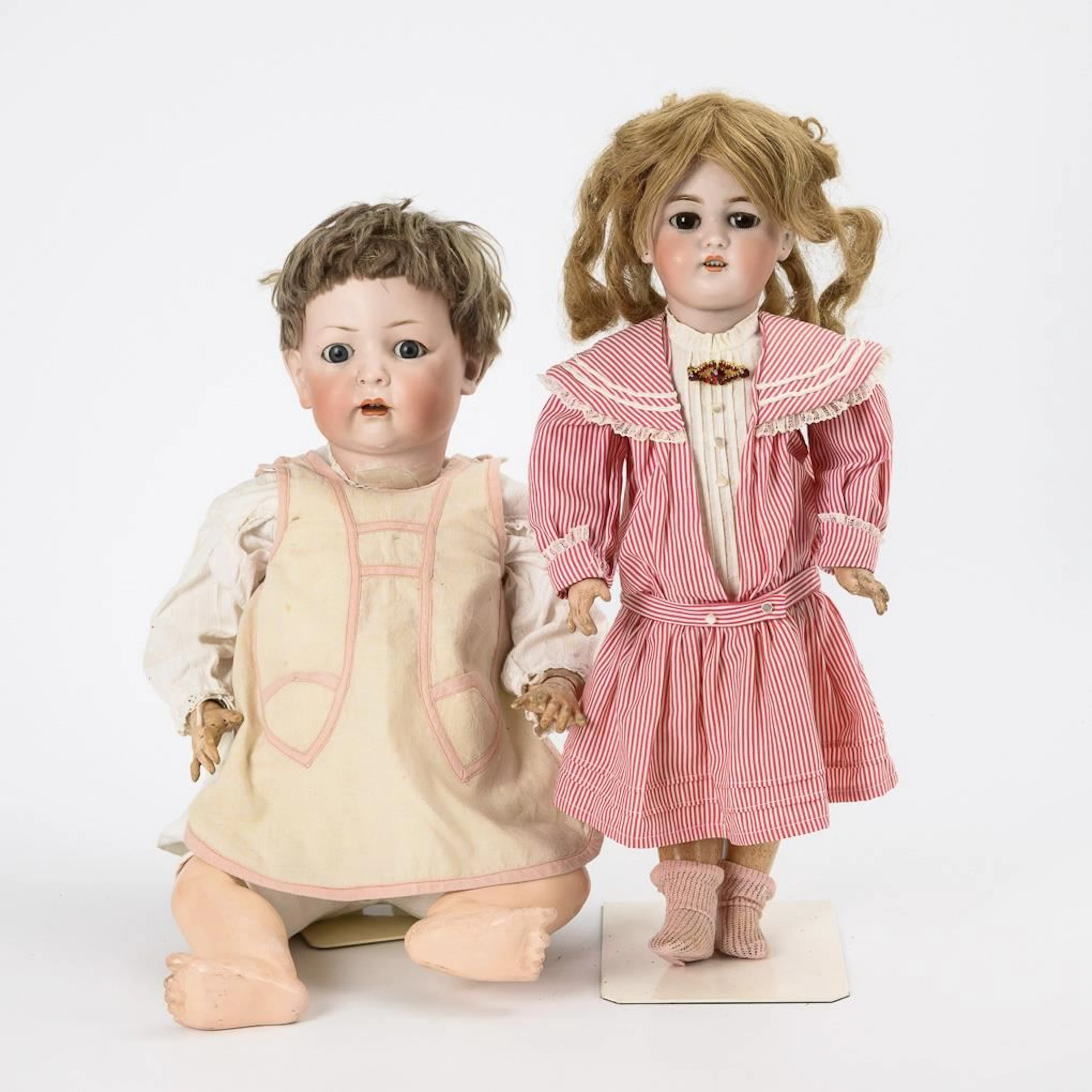 2 broken dolls for crafters.