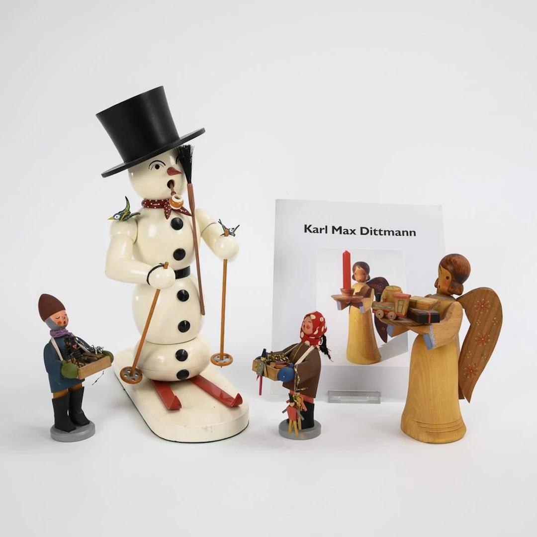 Snowman, angel, and two Striezelkinder.