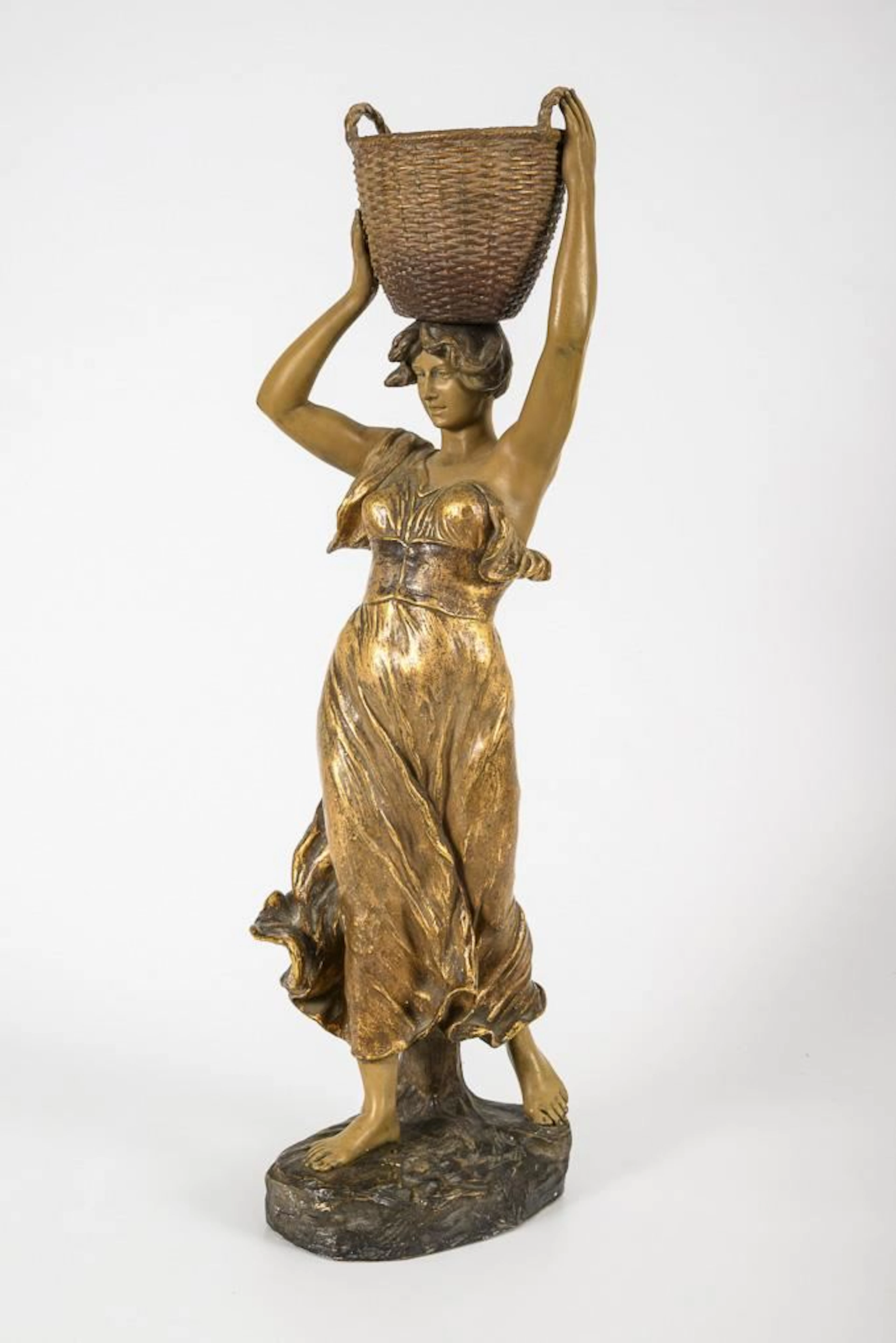 Figure: Woman Carrying a Basket. Vienna-based manufacturer Friedrich