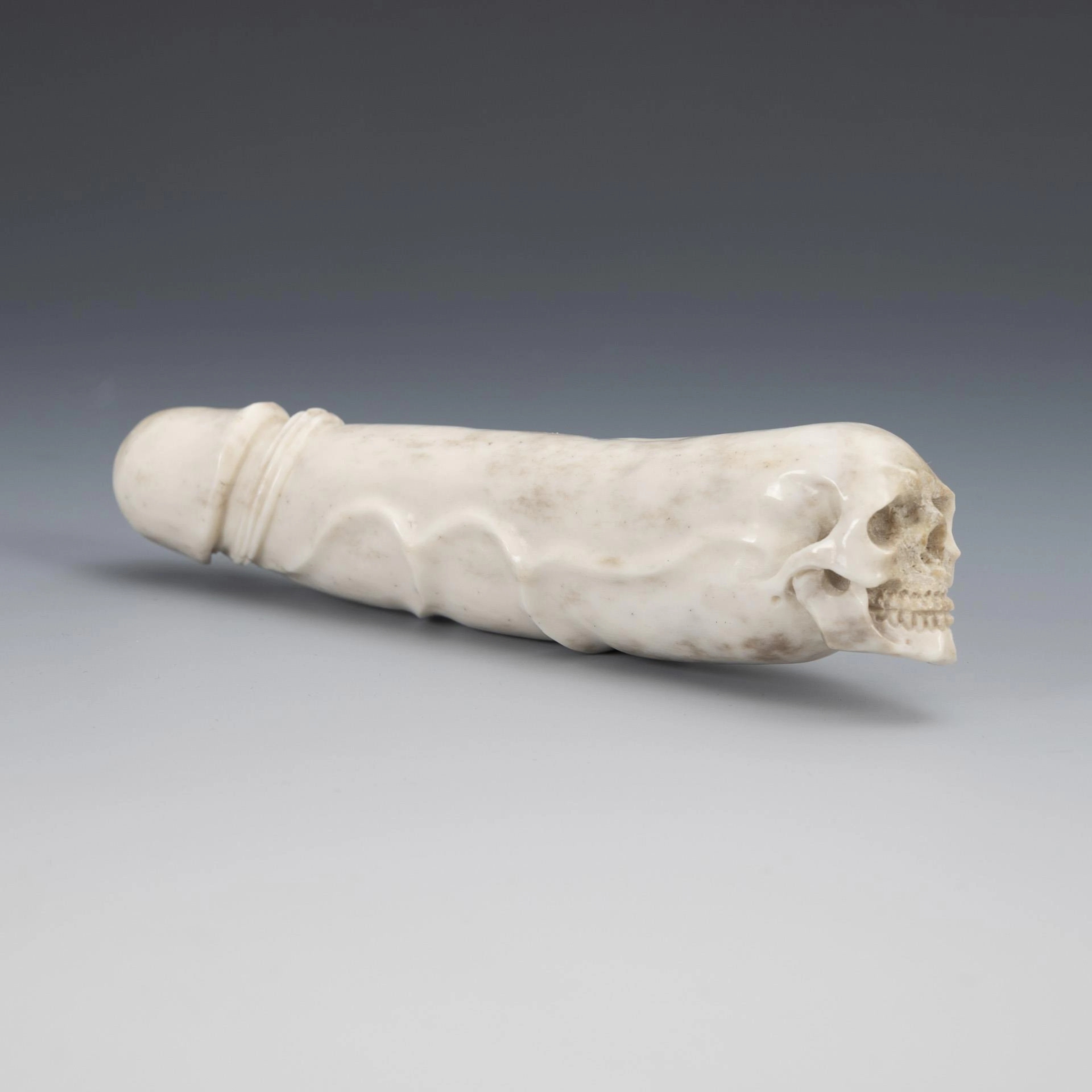 Erotic memento mori object.