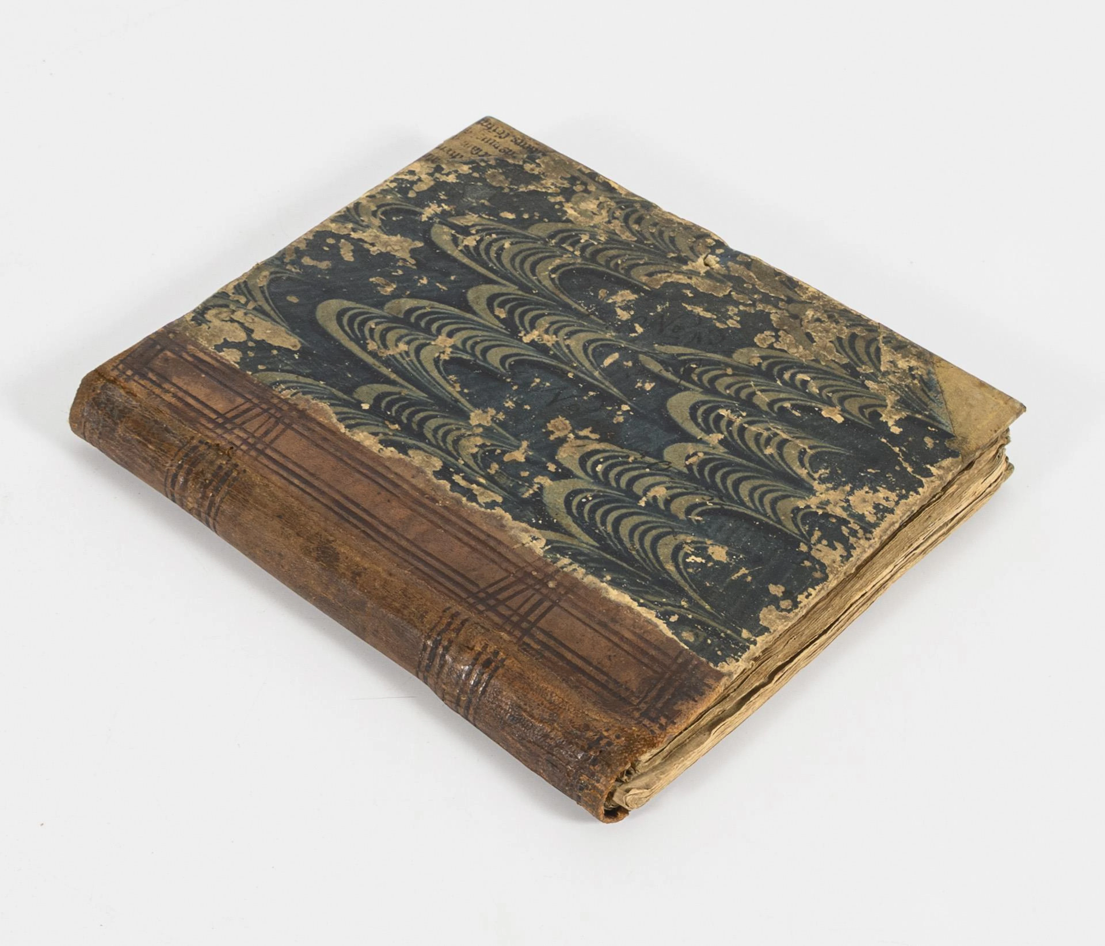 Handwritten book with examples of arithmetic