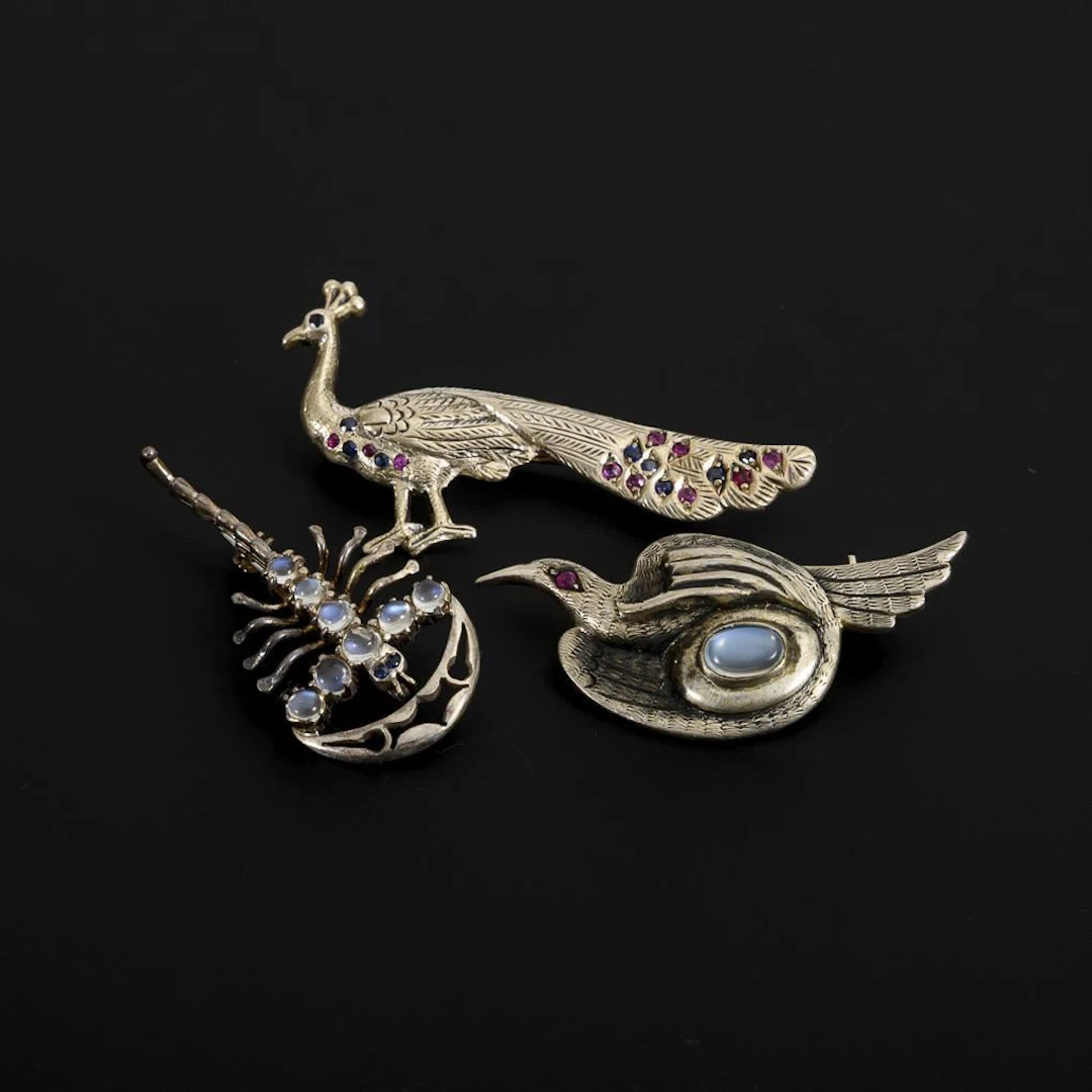 3 animal brooches.