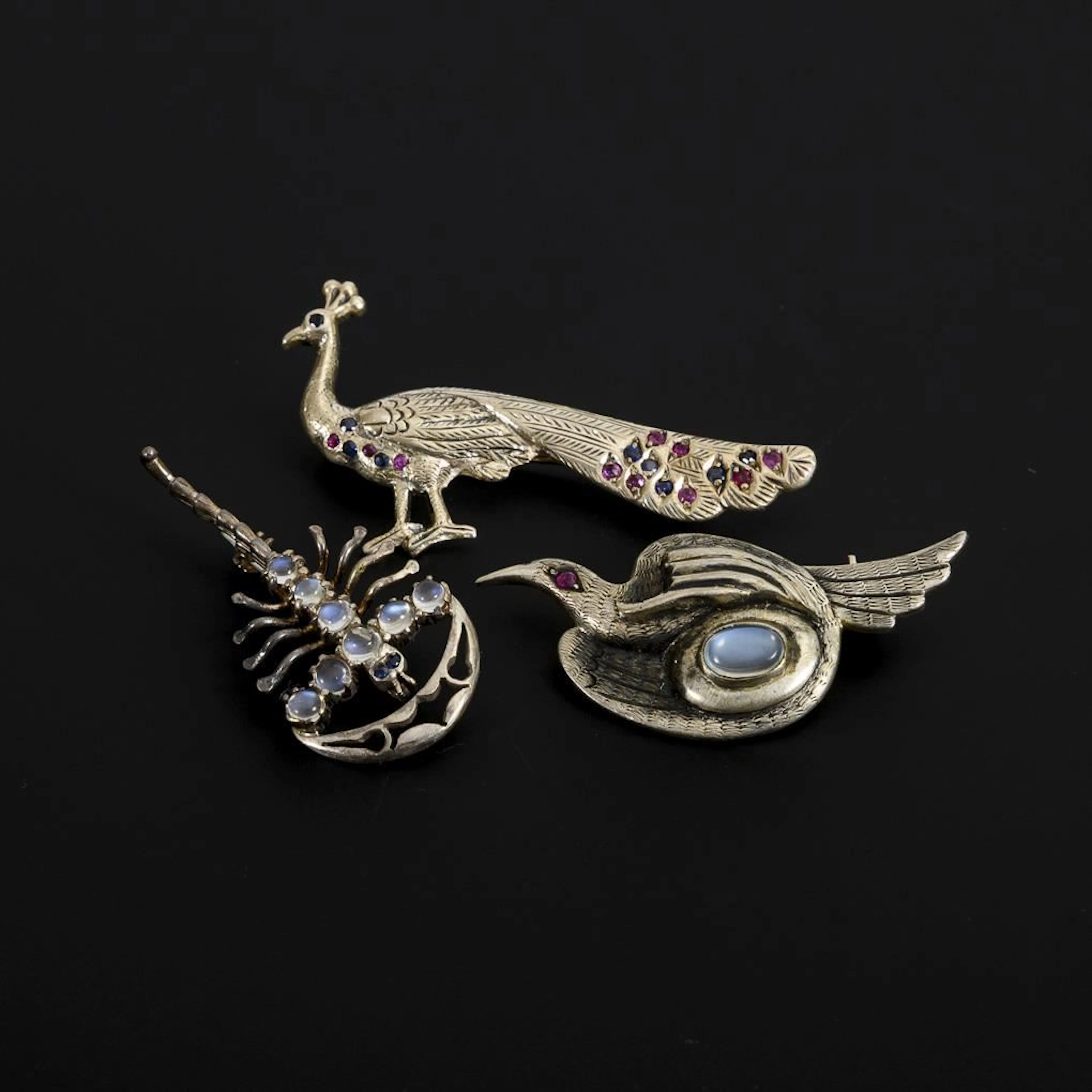 3 animal brooches.