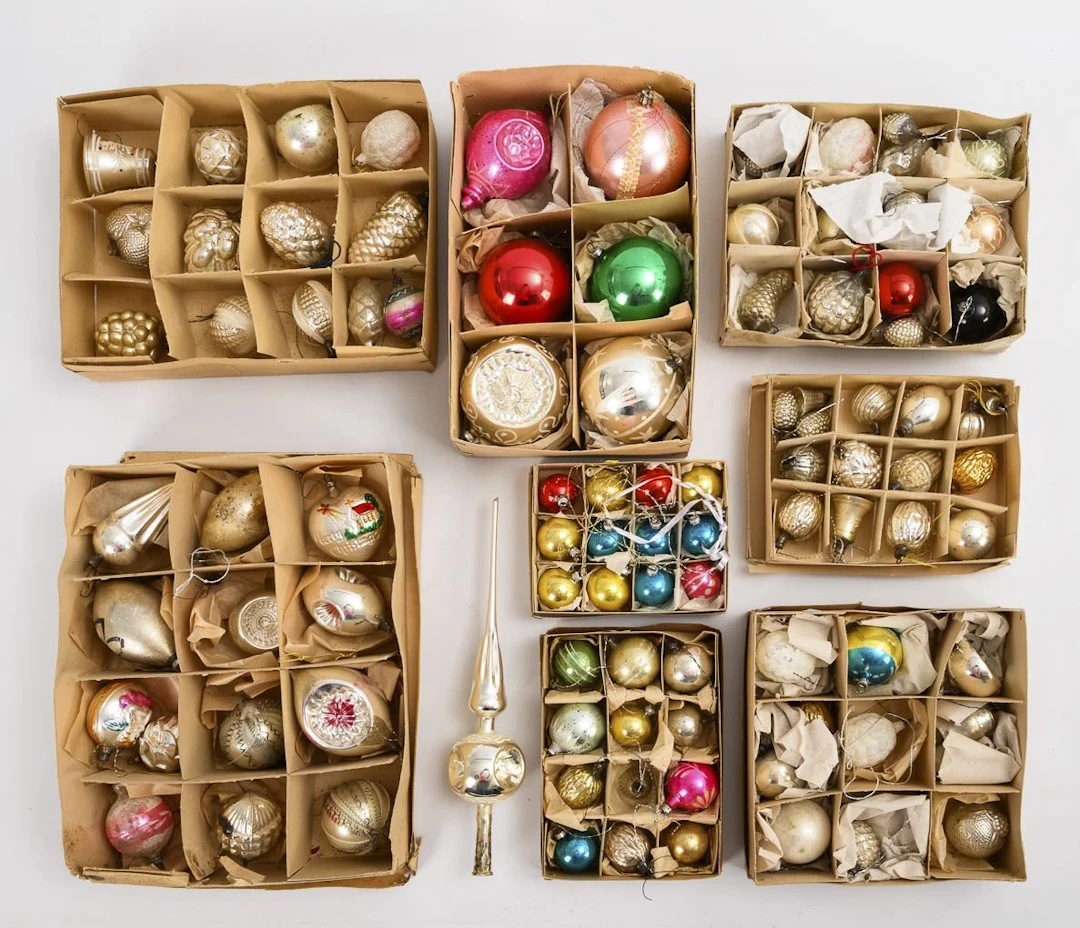 Large assortment of Christmas tree ornaments, plus a Christmas tree topper.