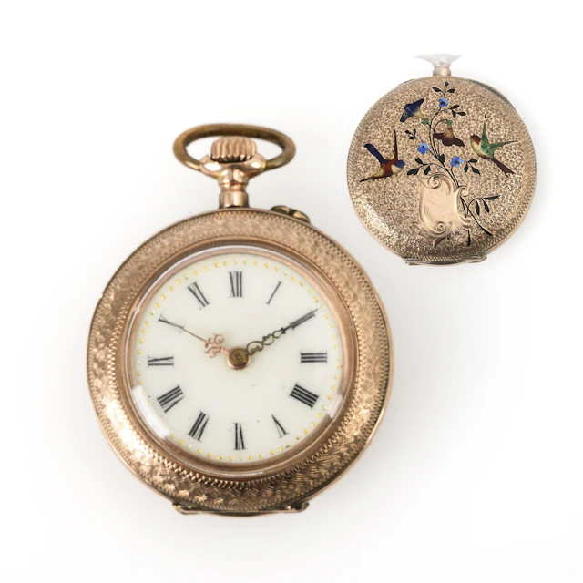 Woman's pocket watch with bird motif.