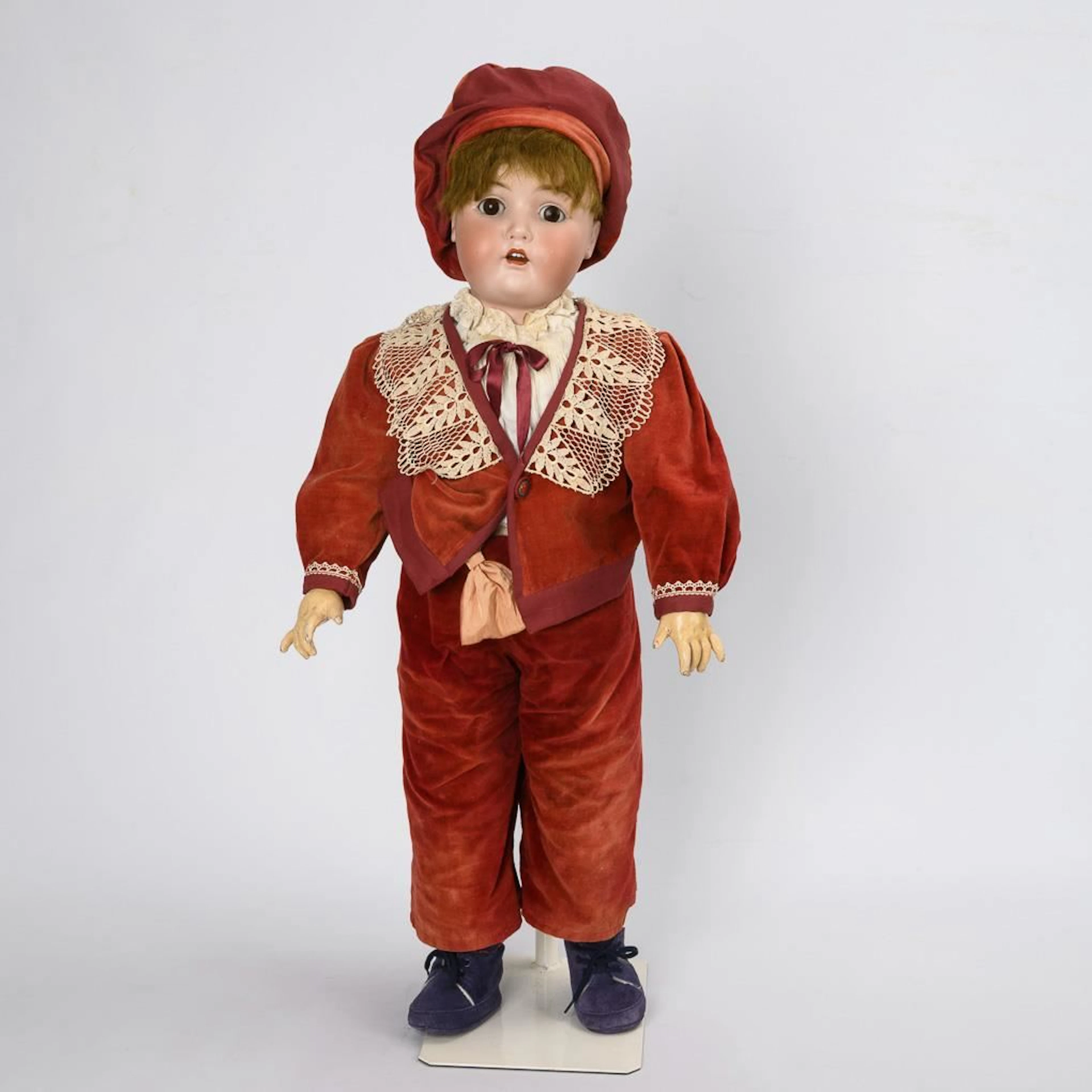 Large boy doll in a red suit. Kestner & Comp.