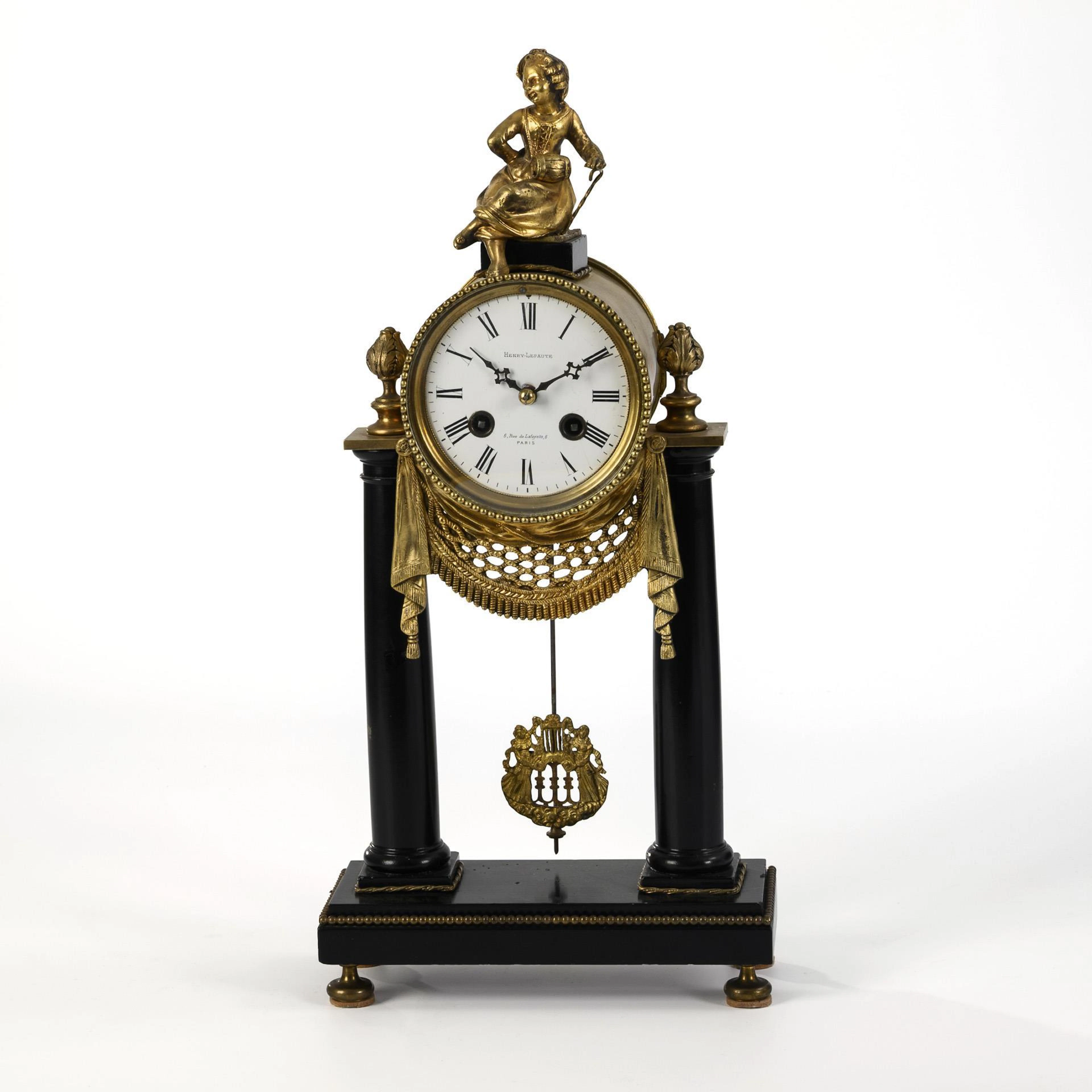 Neoclassical portal clock with crowning female figure. S. Marti & Cie, Paris.