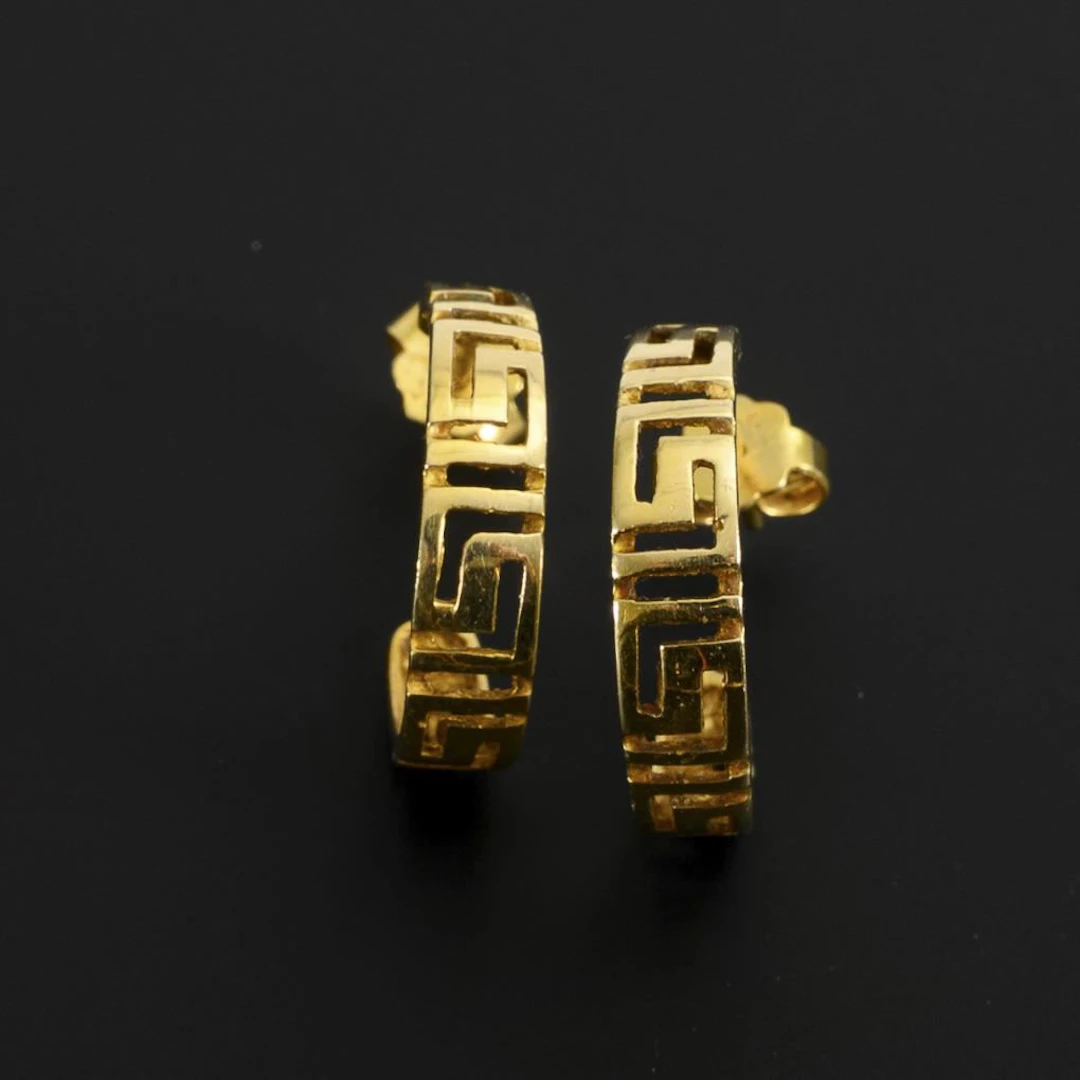 Hoop earrings with a meander pattern.