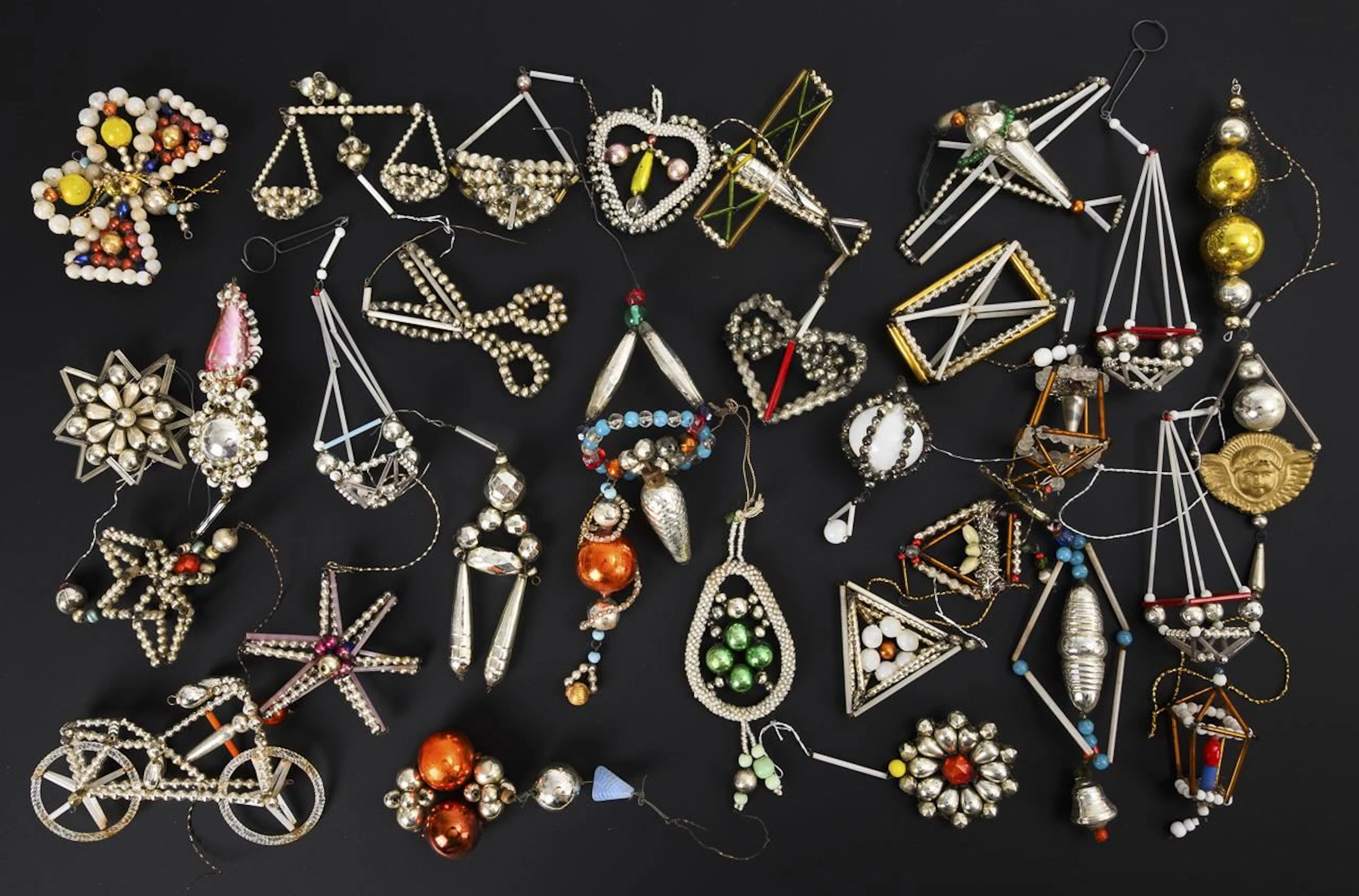 Assortment of Gablonz Christmas tree ornaments.