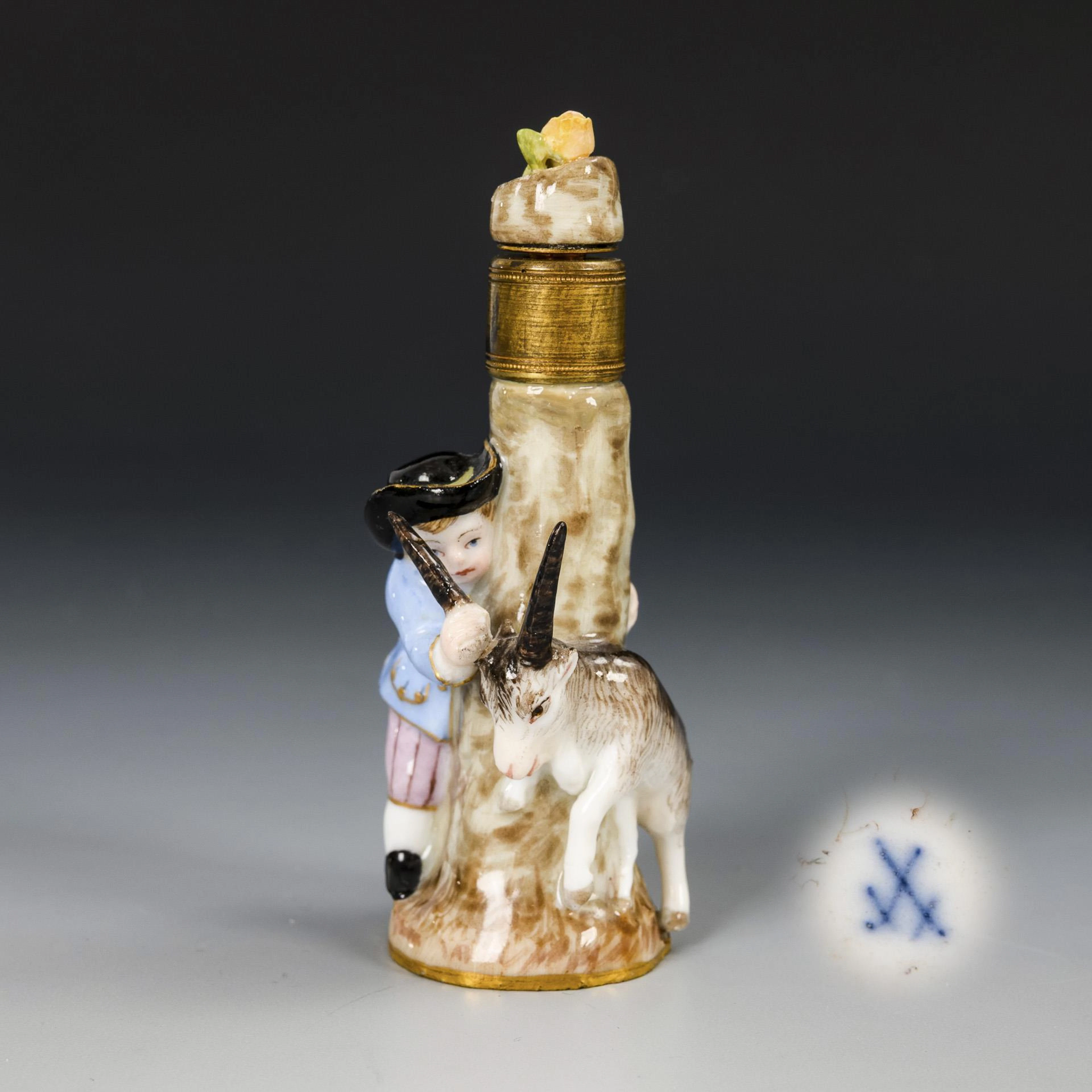 Flacon with billy goat and boy. Meissen.