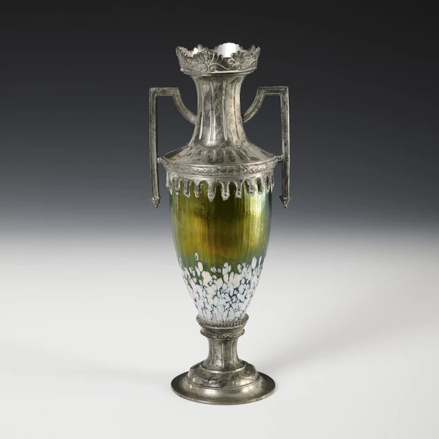 Art Nouveau vase with pewter mount.