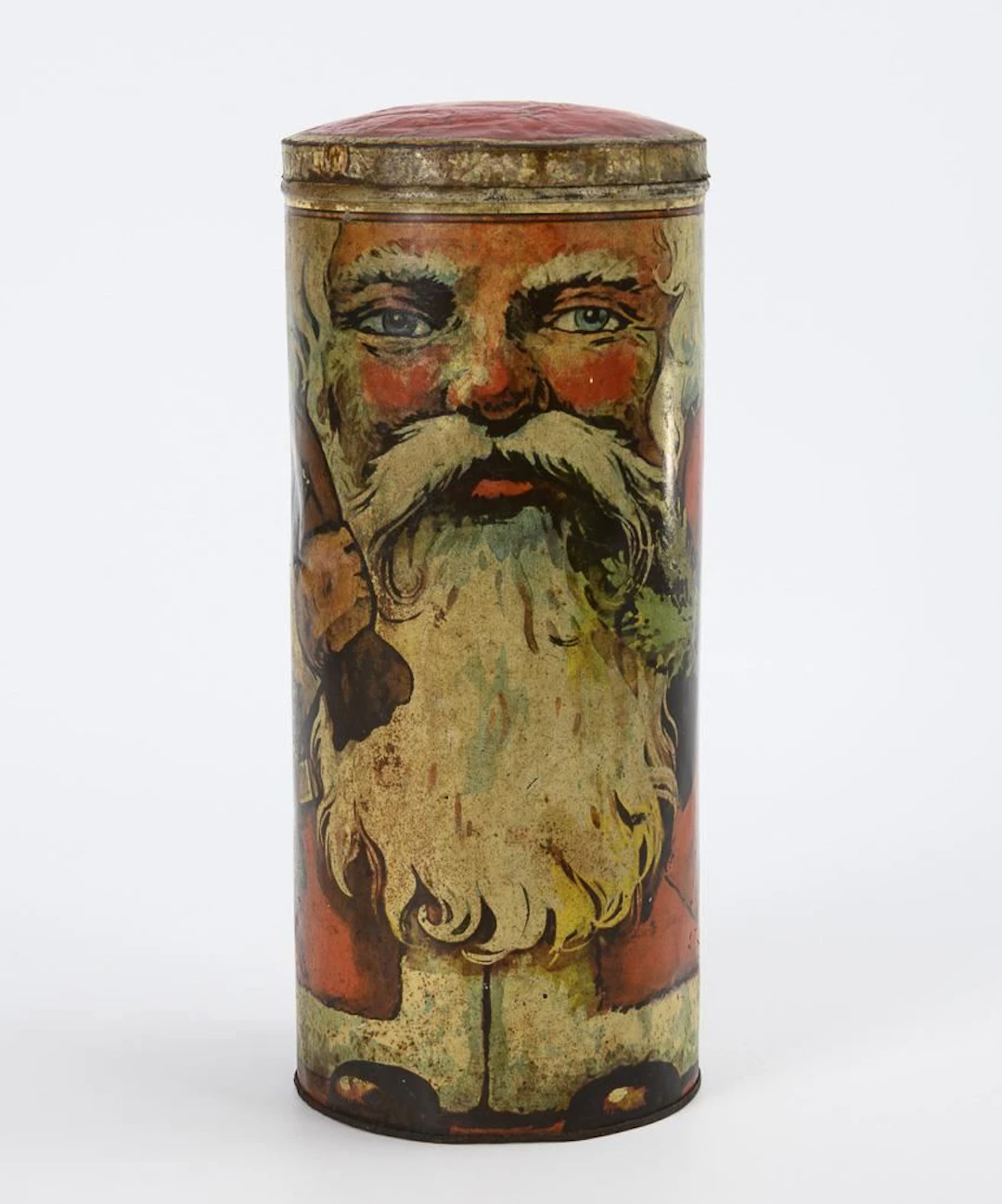 Old tin can featuring Santa Claus.