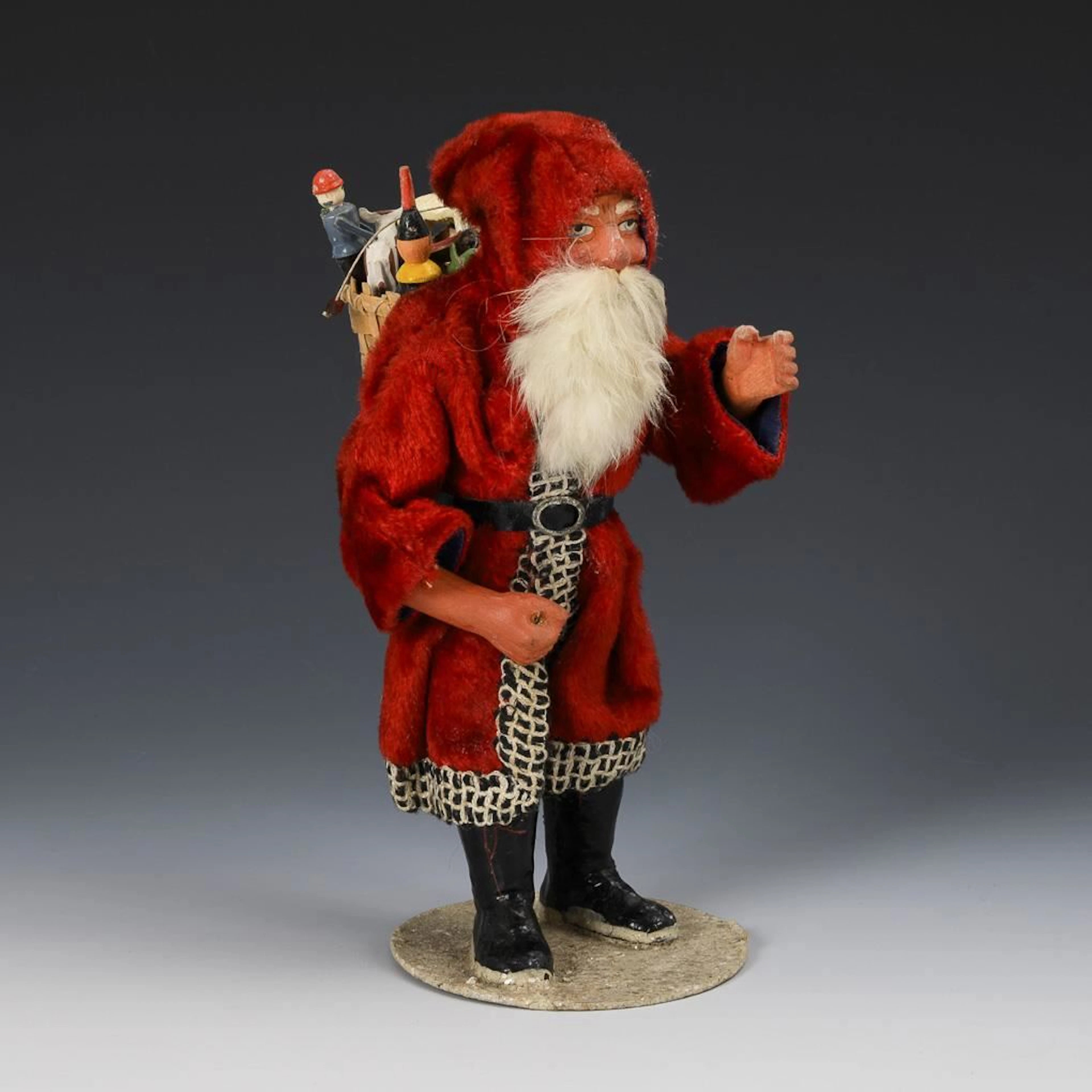 Santa Claus in a red velvet coat.