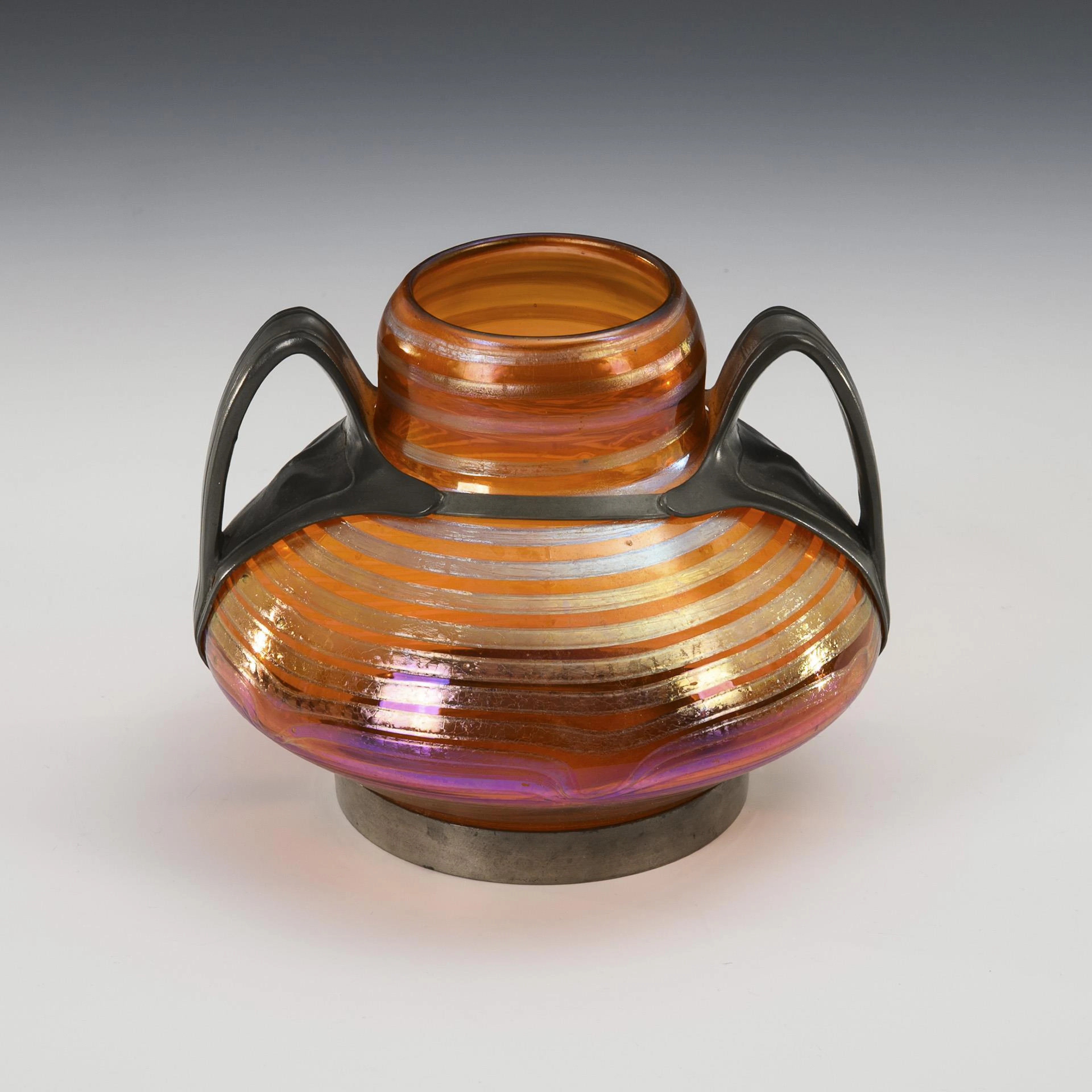 Art Nouveau vase with pewter mount.