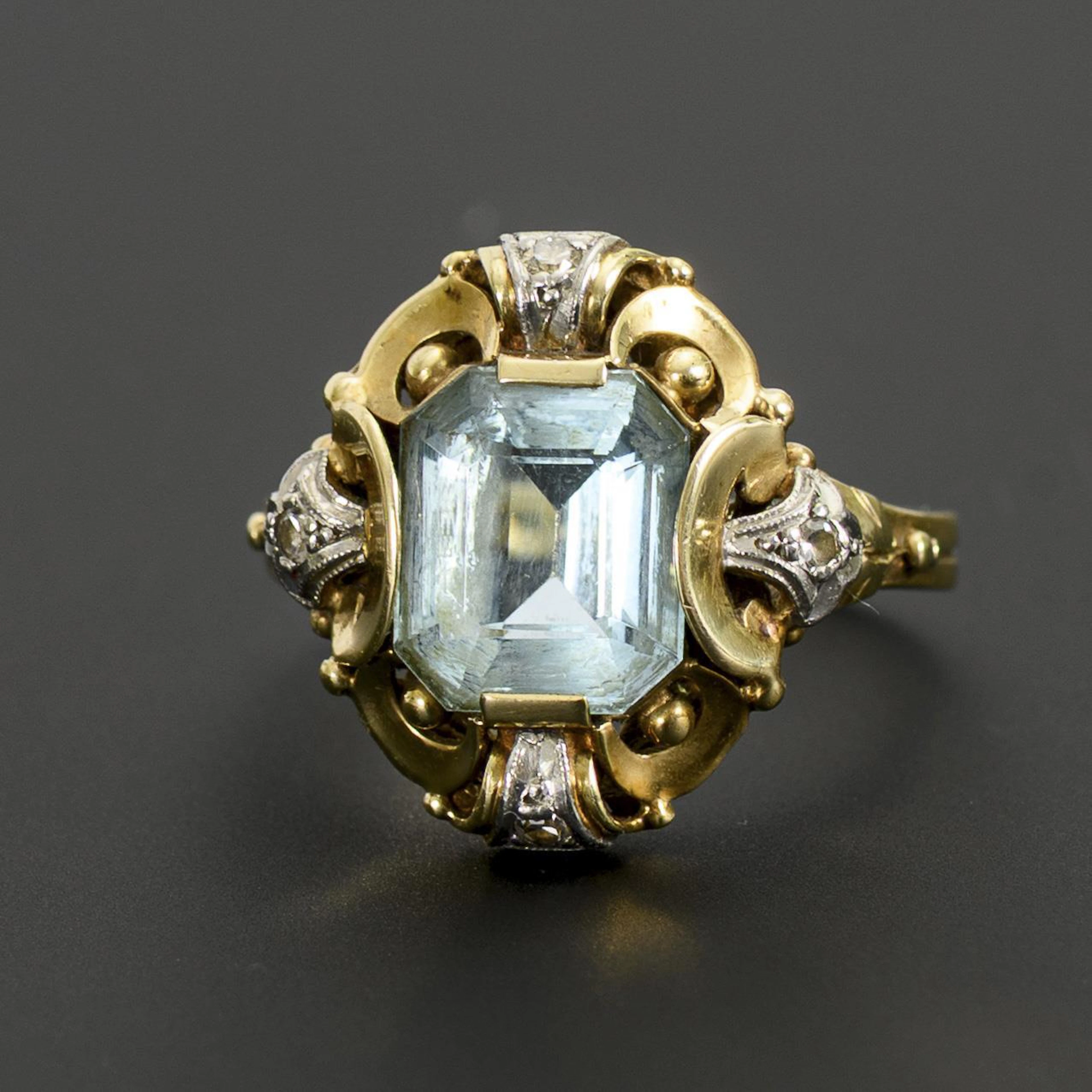 Late Art Deco ring with blue colored stone.