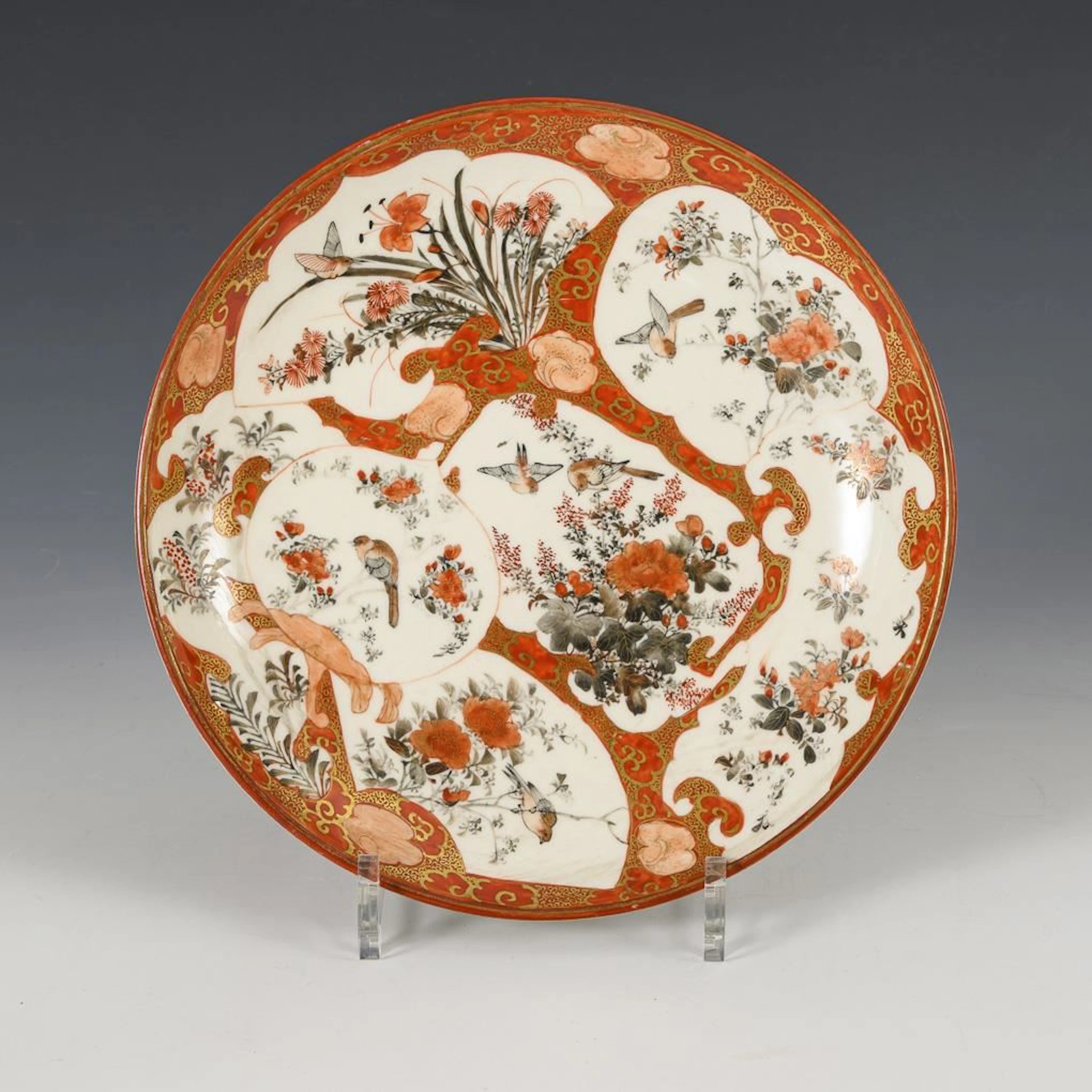Porcelain plate with delicate painting.