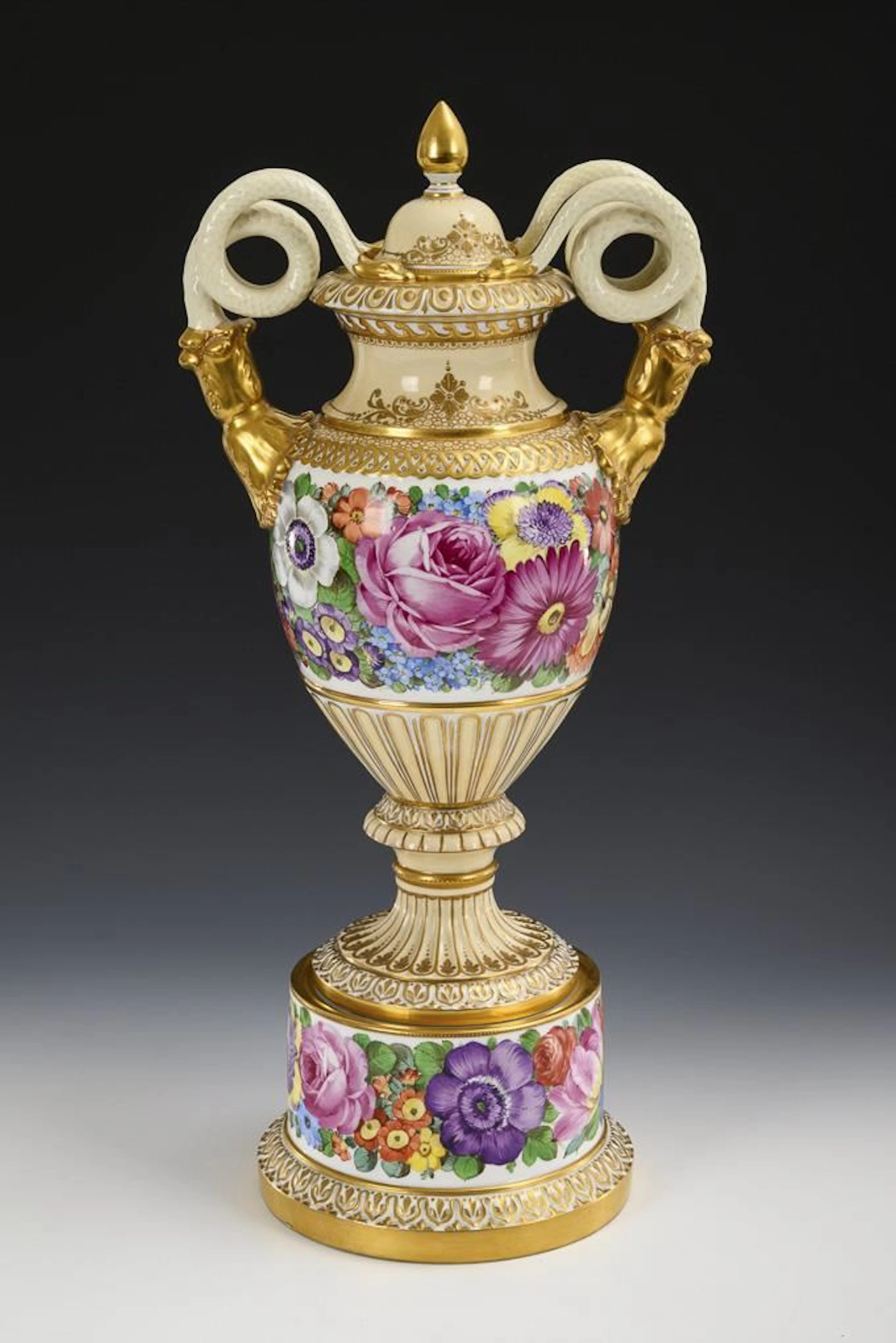 Vase with a snake-shaped handle and lid, featuring floral paintings.