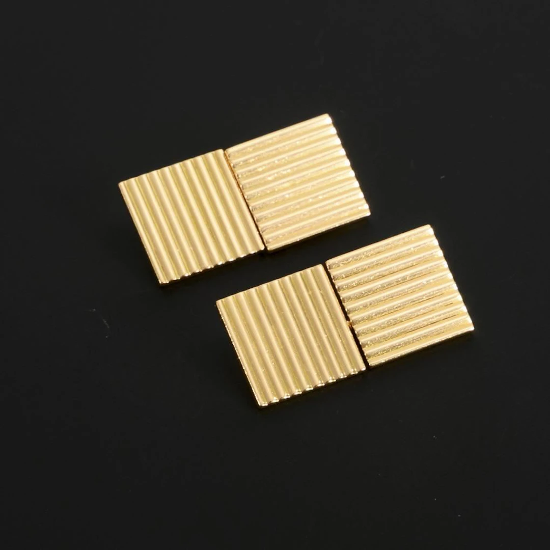 Cufflinks by CARTIER.
