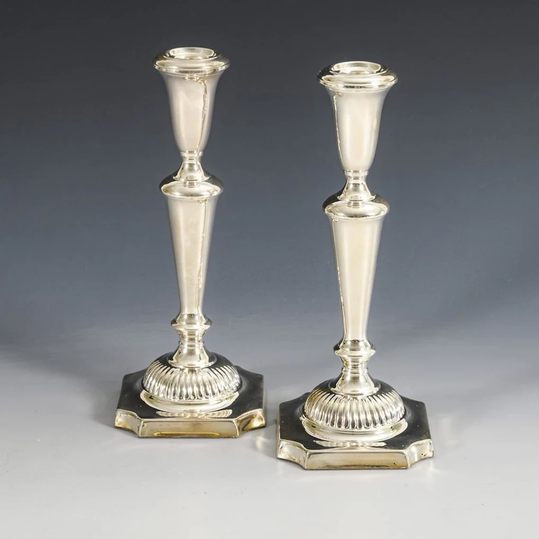 Pair of silver candlesticks. Probably Empire-style sterling.