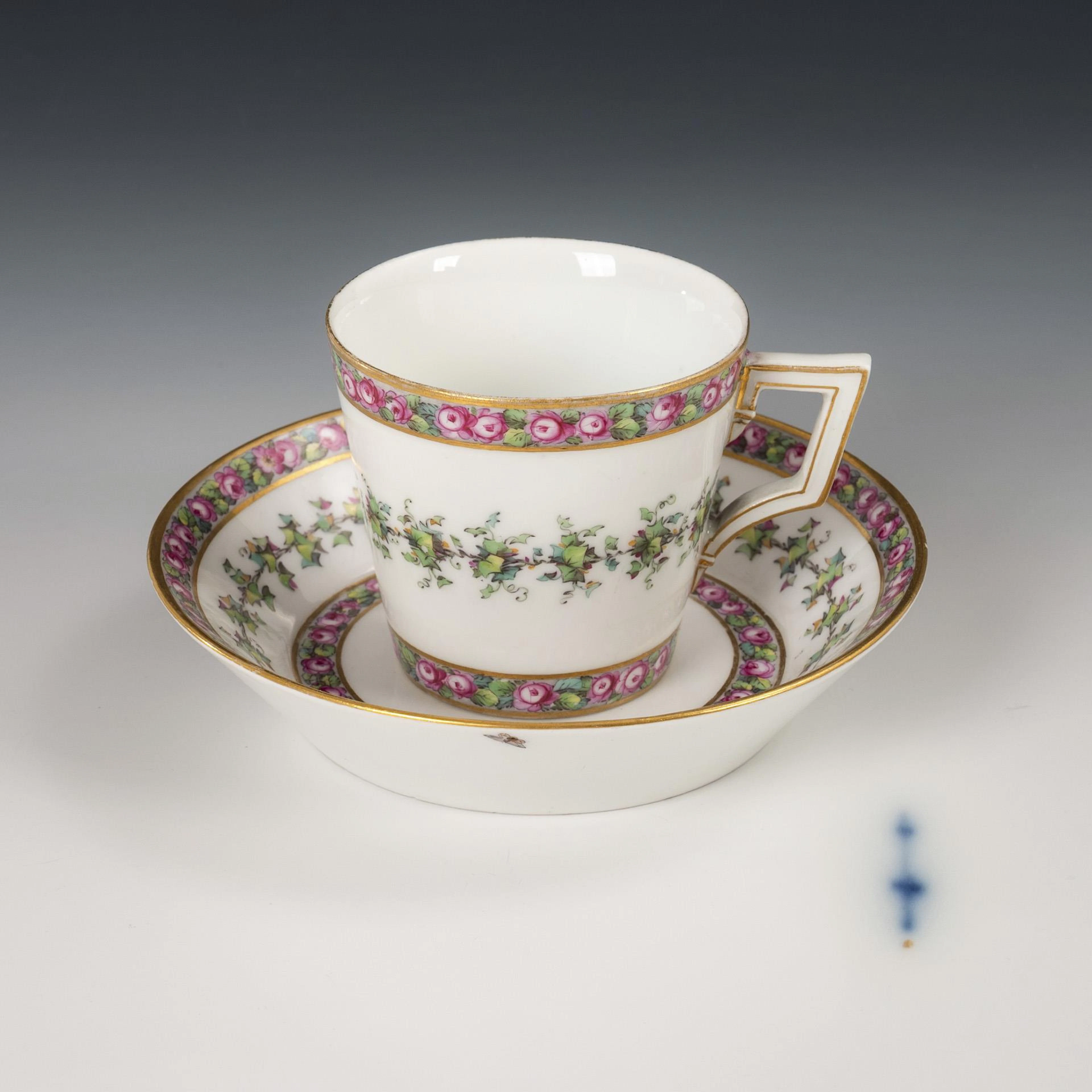 Empire vitrine cup with rose border. KPM Berlin.