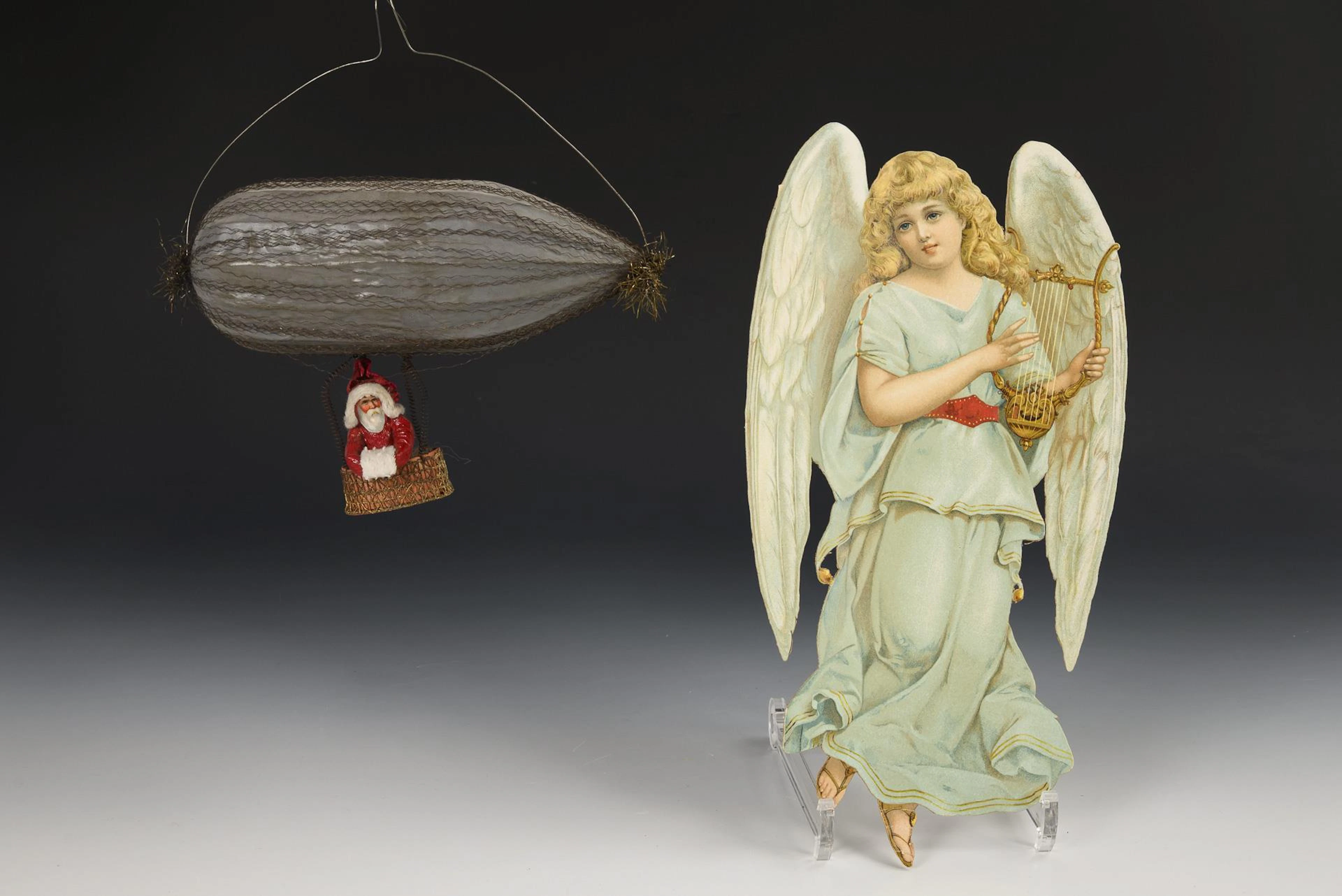 2 parts Christmas tree decoration: Zeppelin and lithographed angel.
