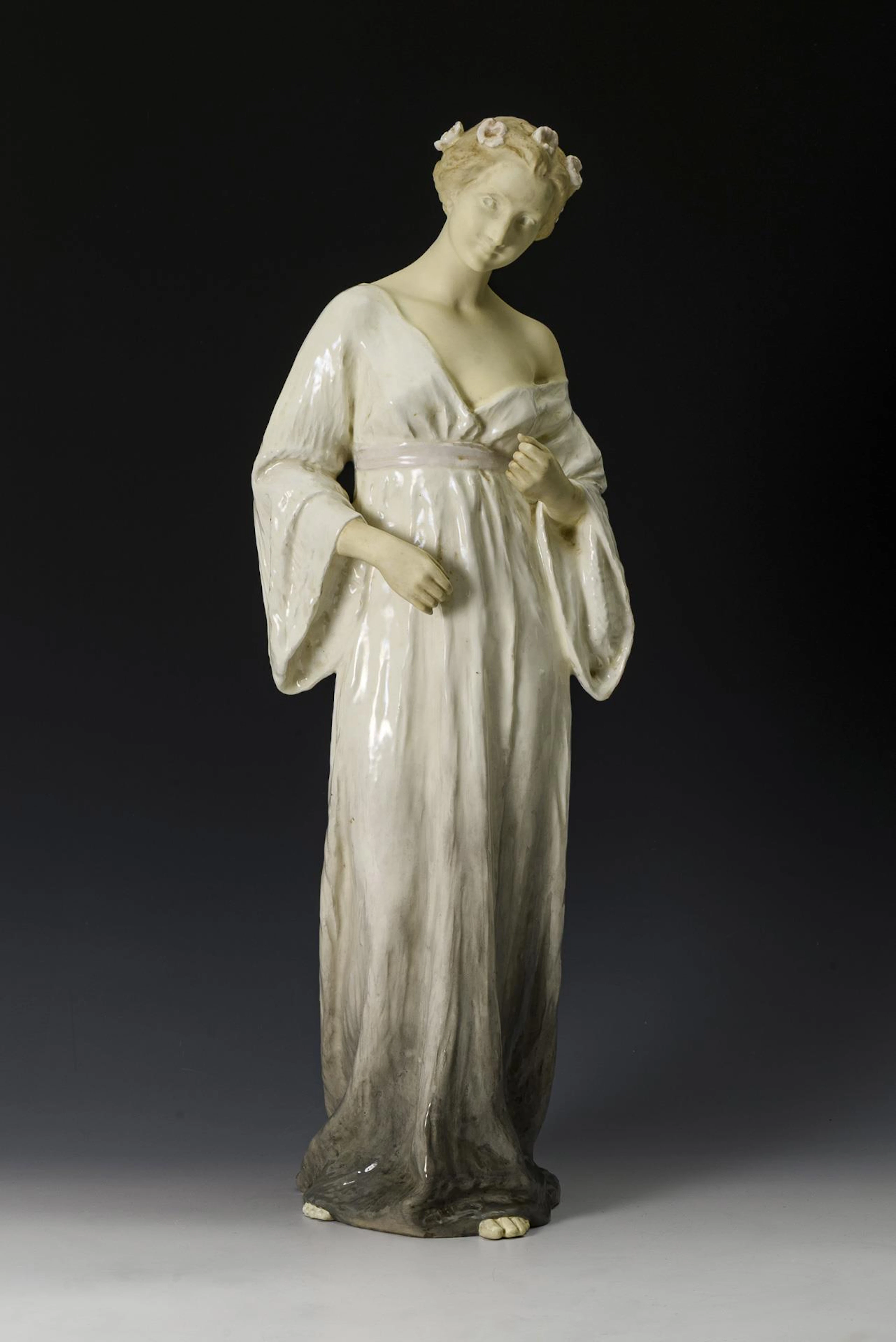 Large Art Nouveau female figure in long dress. Vienna enamel paint