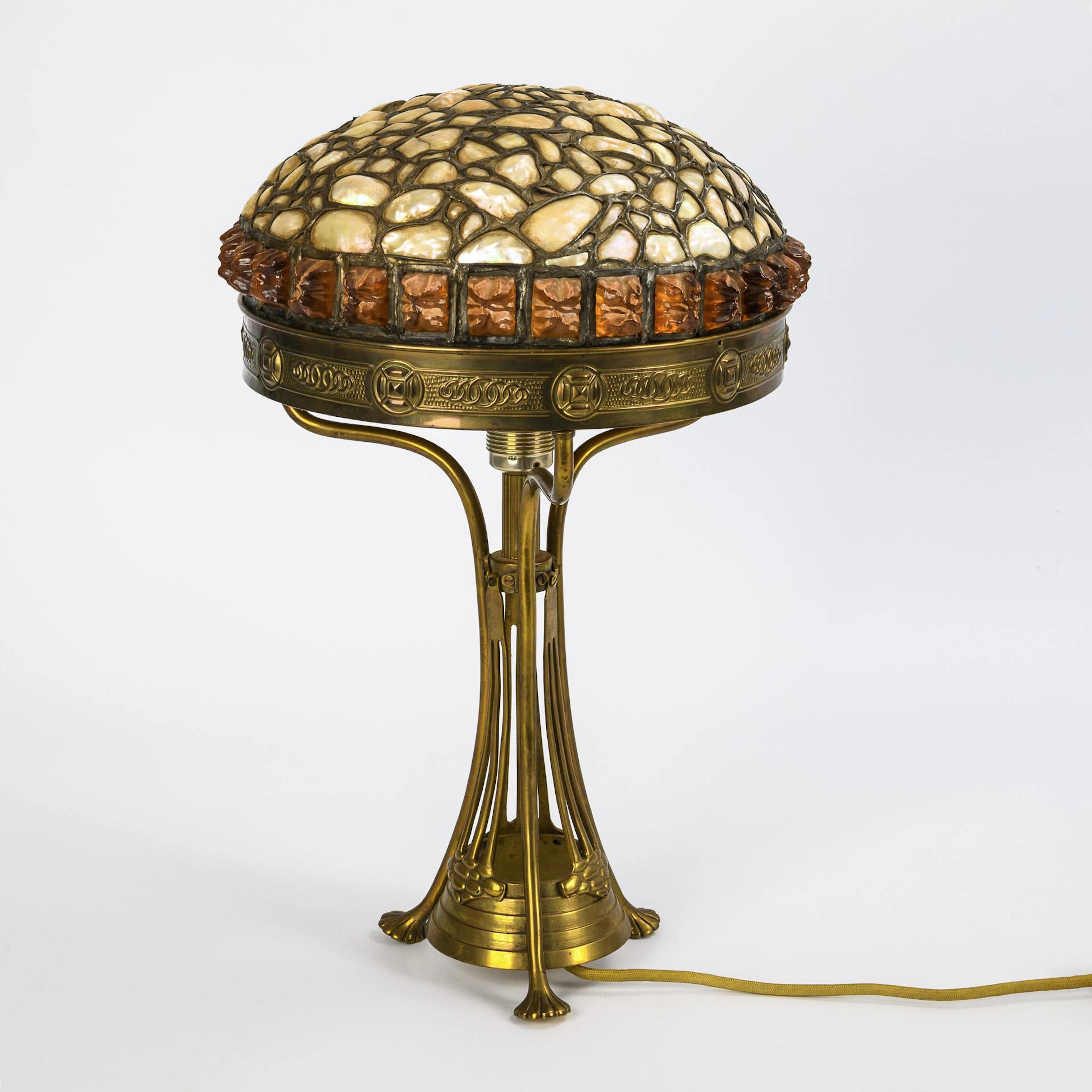 Art deco lamp with unusual lampshade.