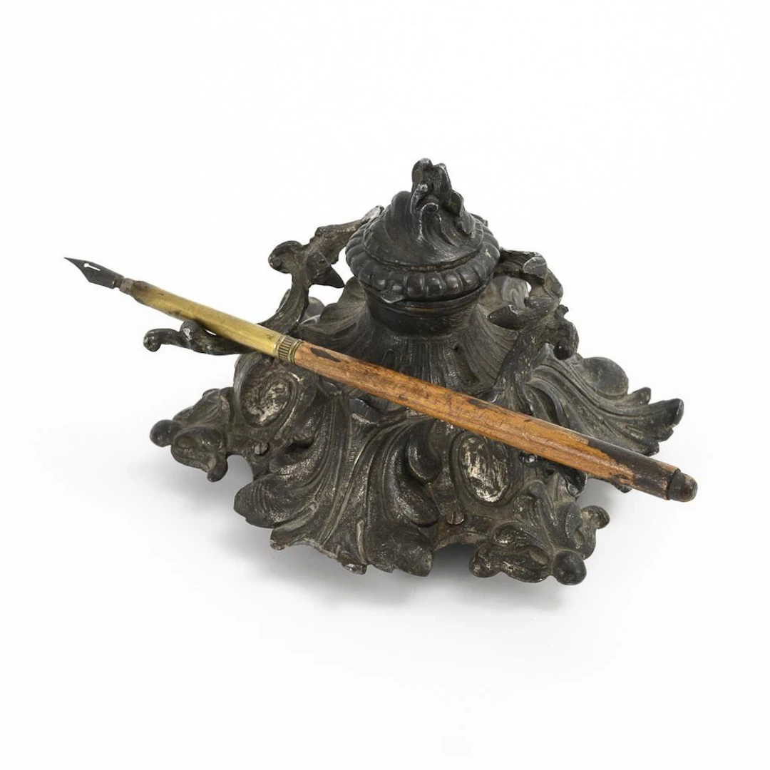 Inkwell with music box.