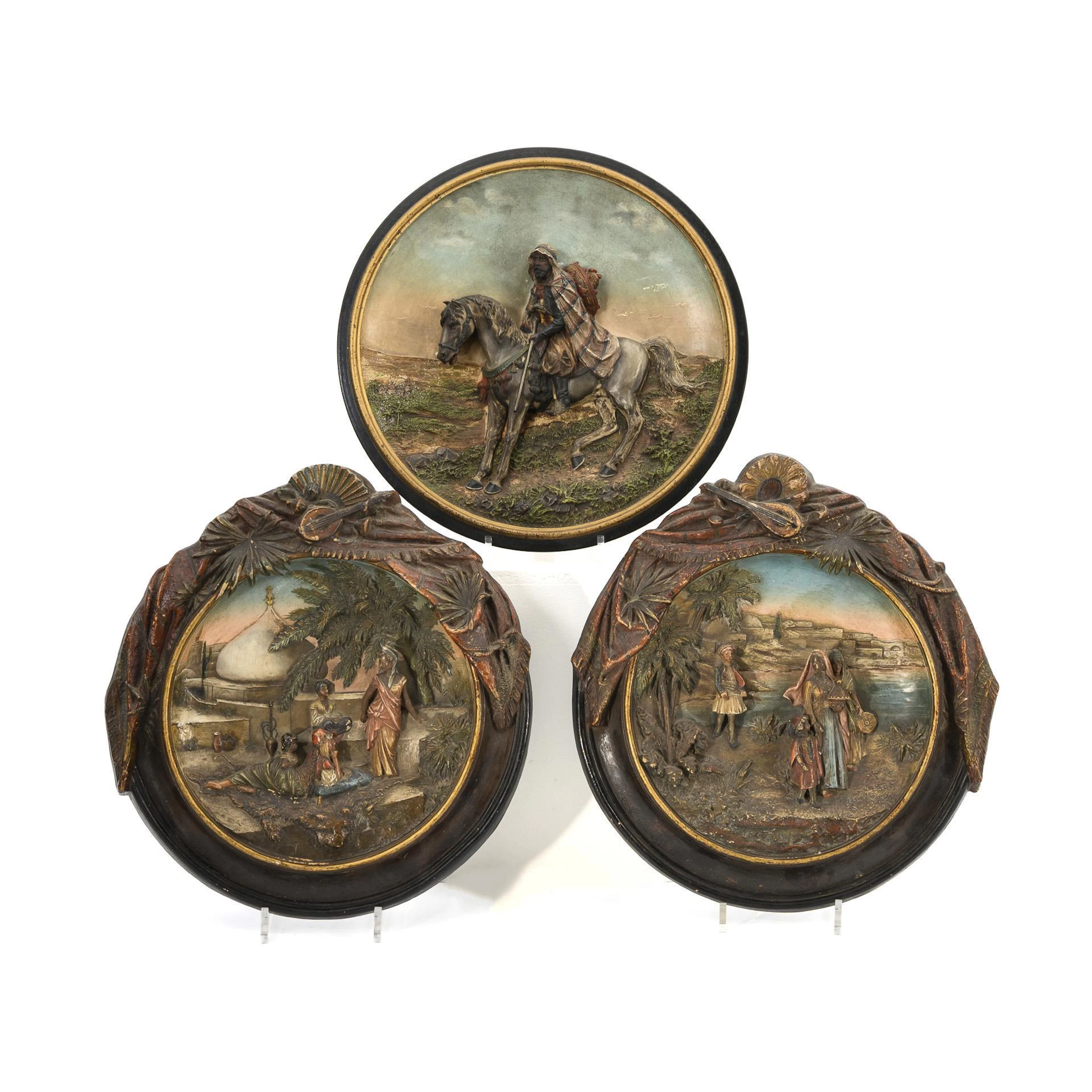 3 wall reliefs with Orientalist scenes.