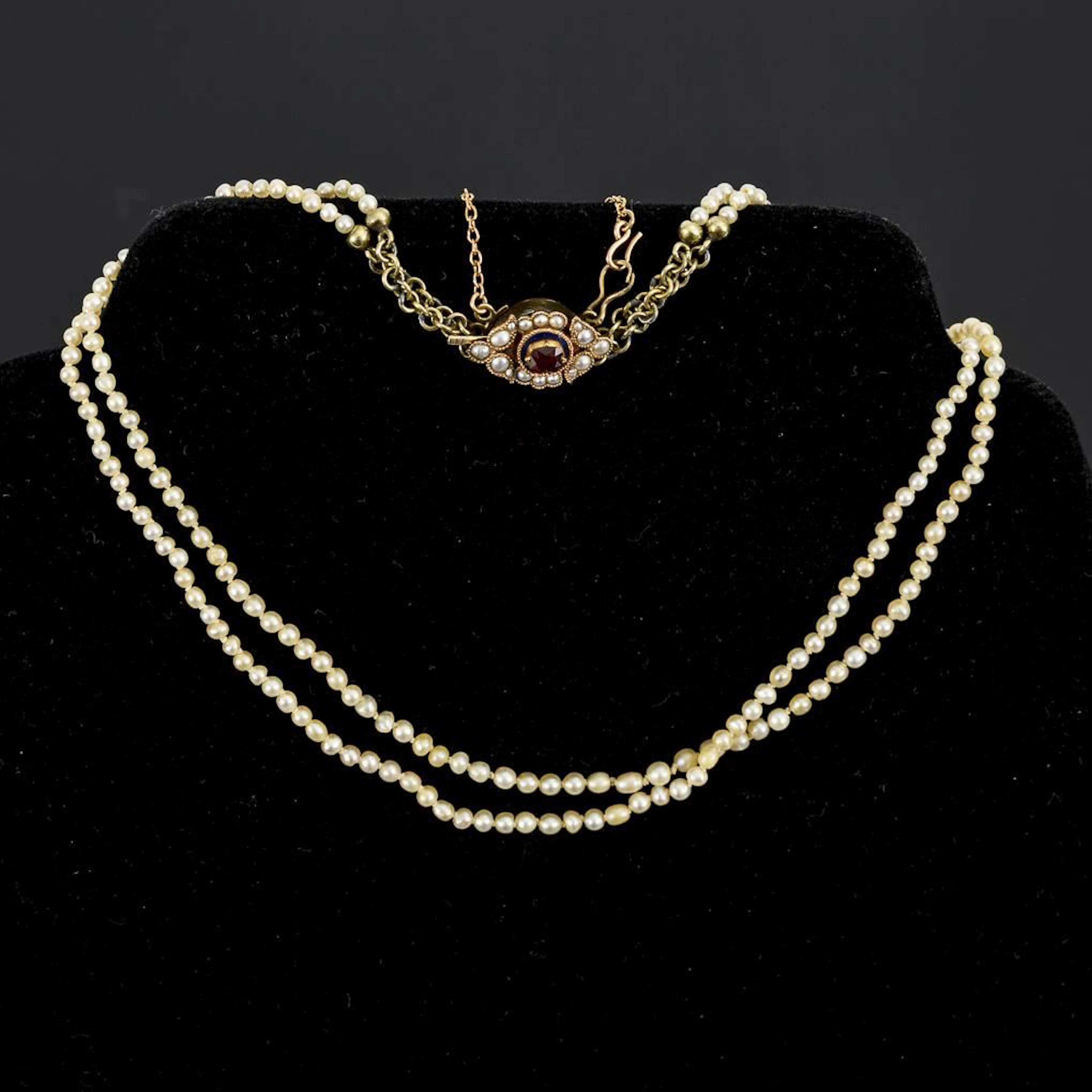 High-quality, vintage, 2-strand pearl necklace.
