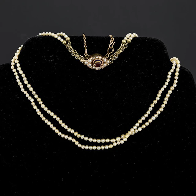 High-quality, vintage, 2-strand pearl necklace.