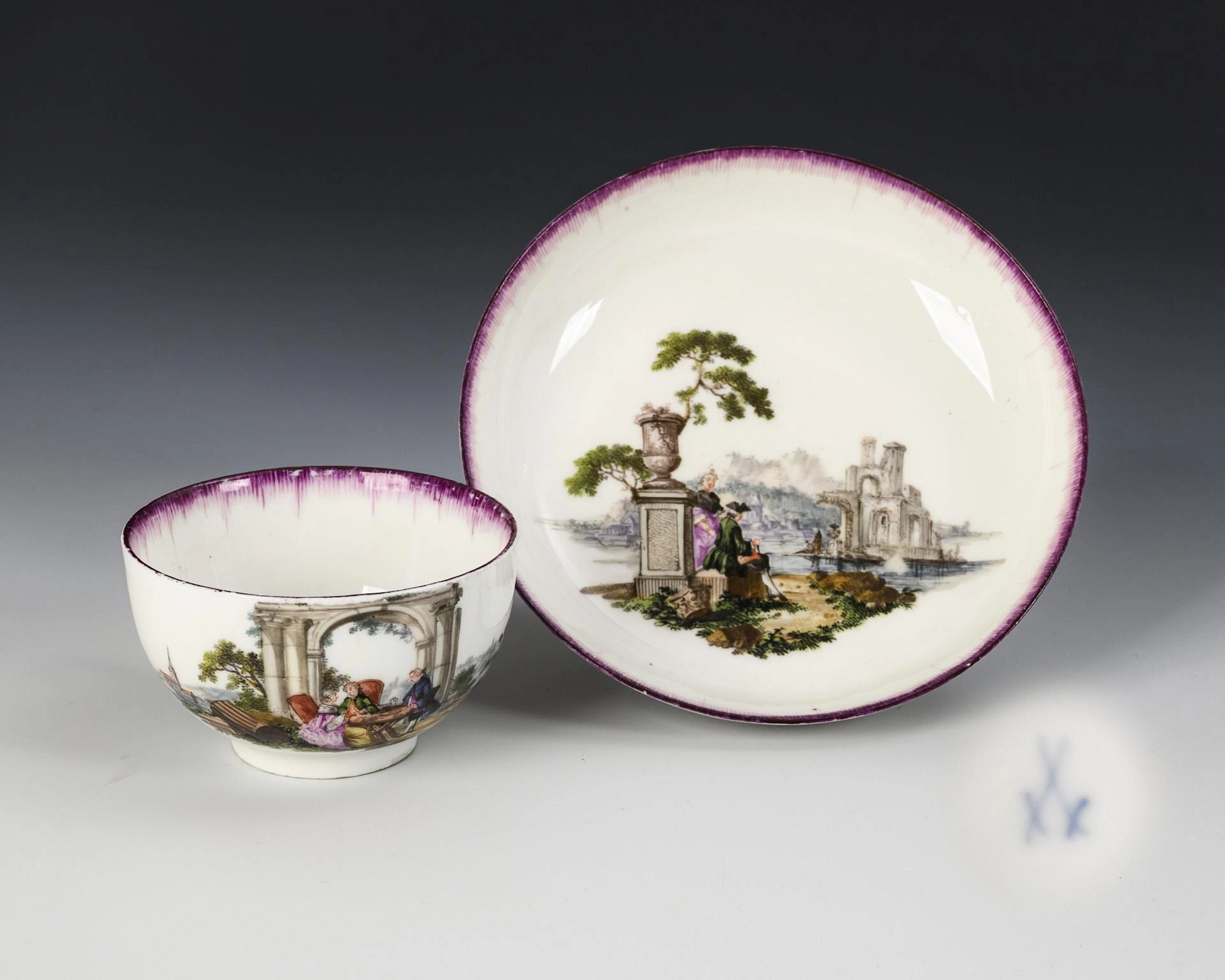 Baroque cup with landscape and figure painting. Meissen.