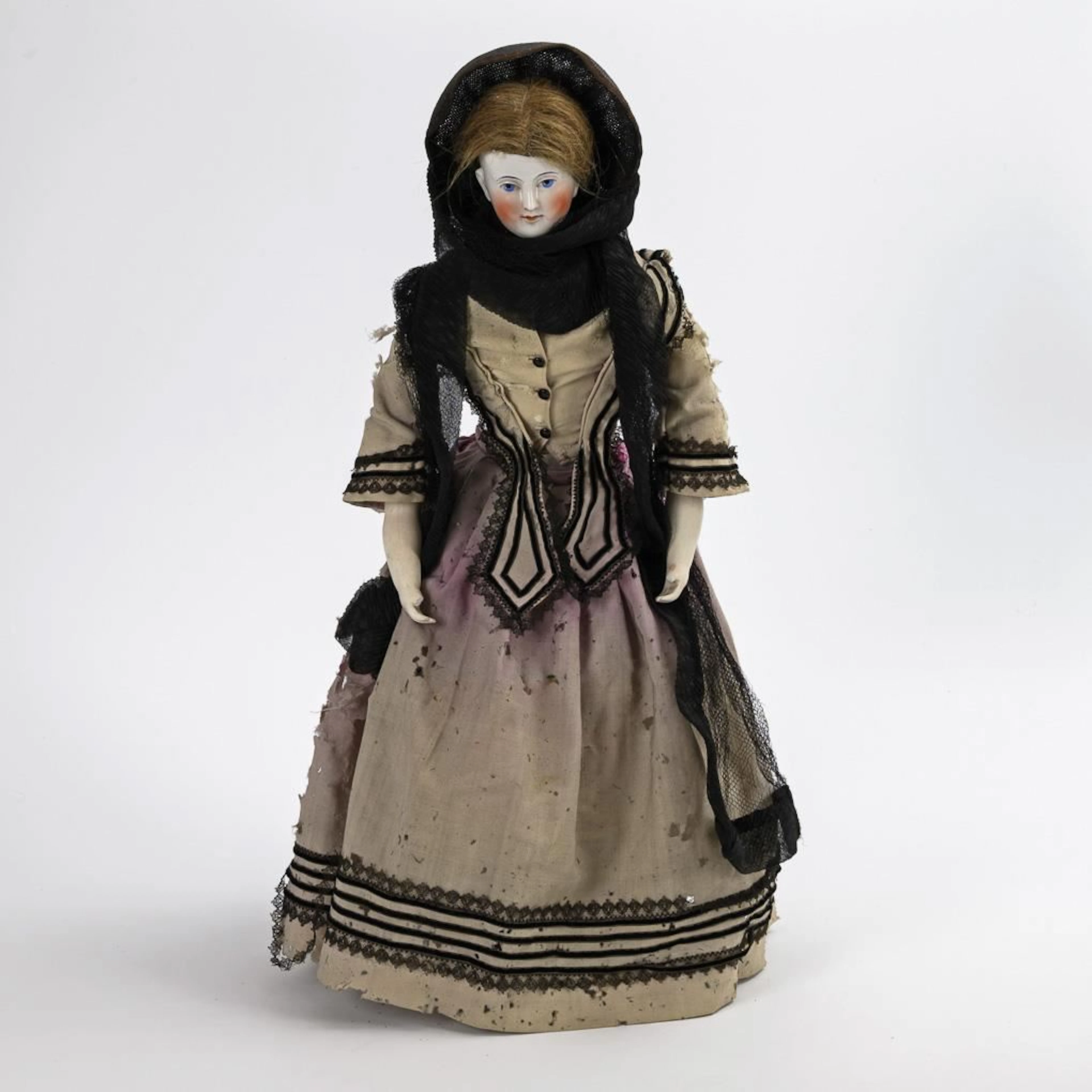Original-clothed bust doll.