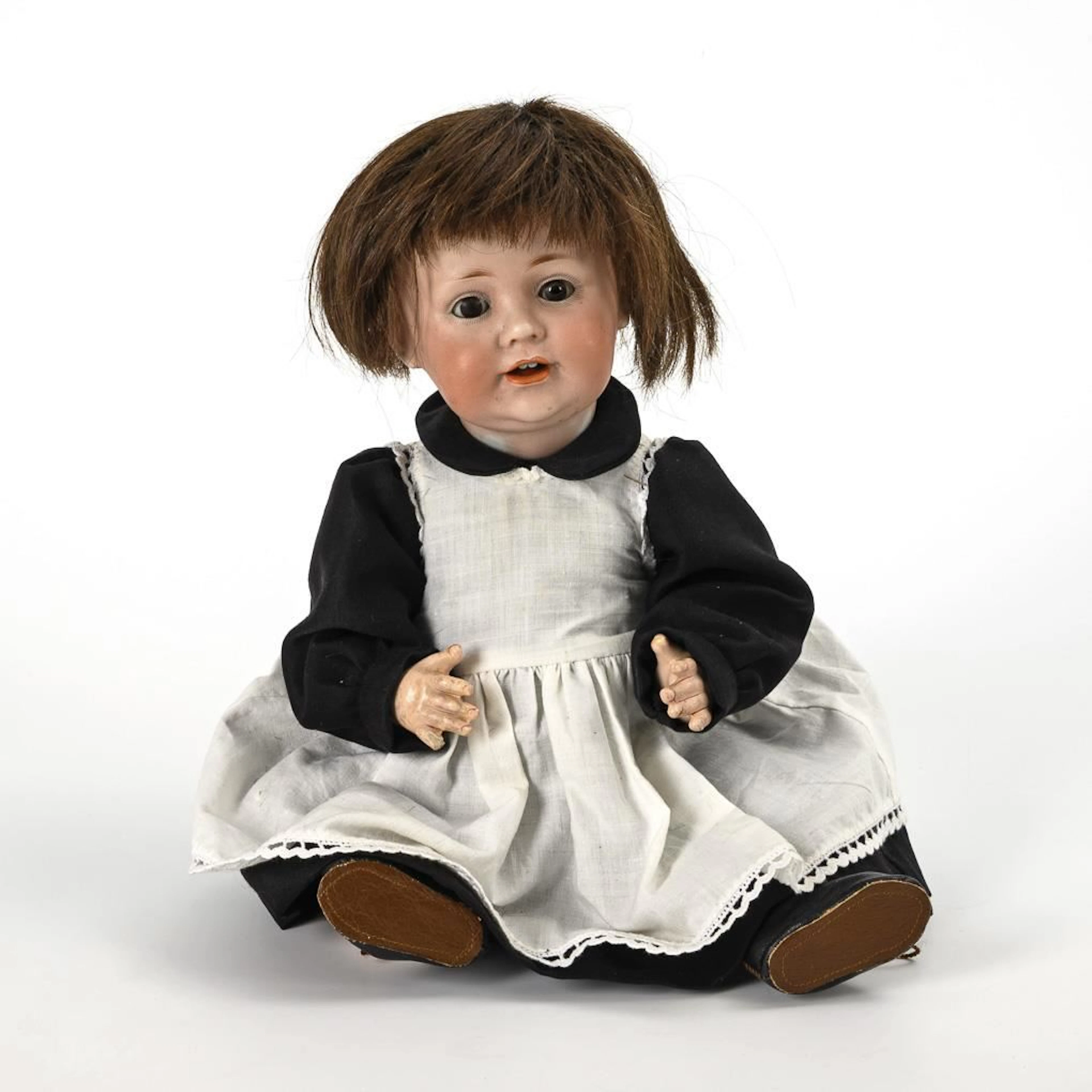 Character doll with a brown wig. J.D. Kestner.