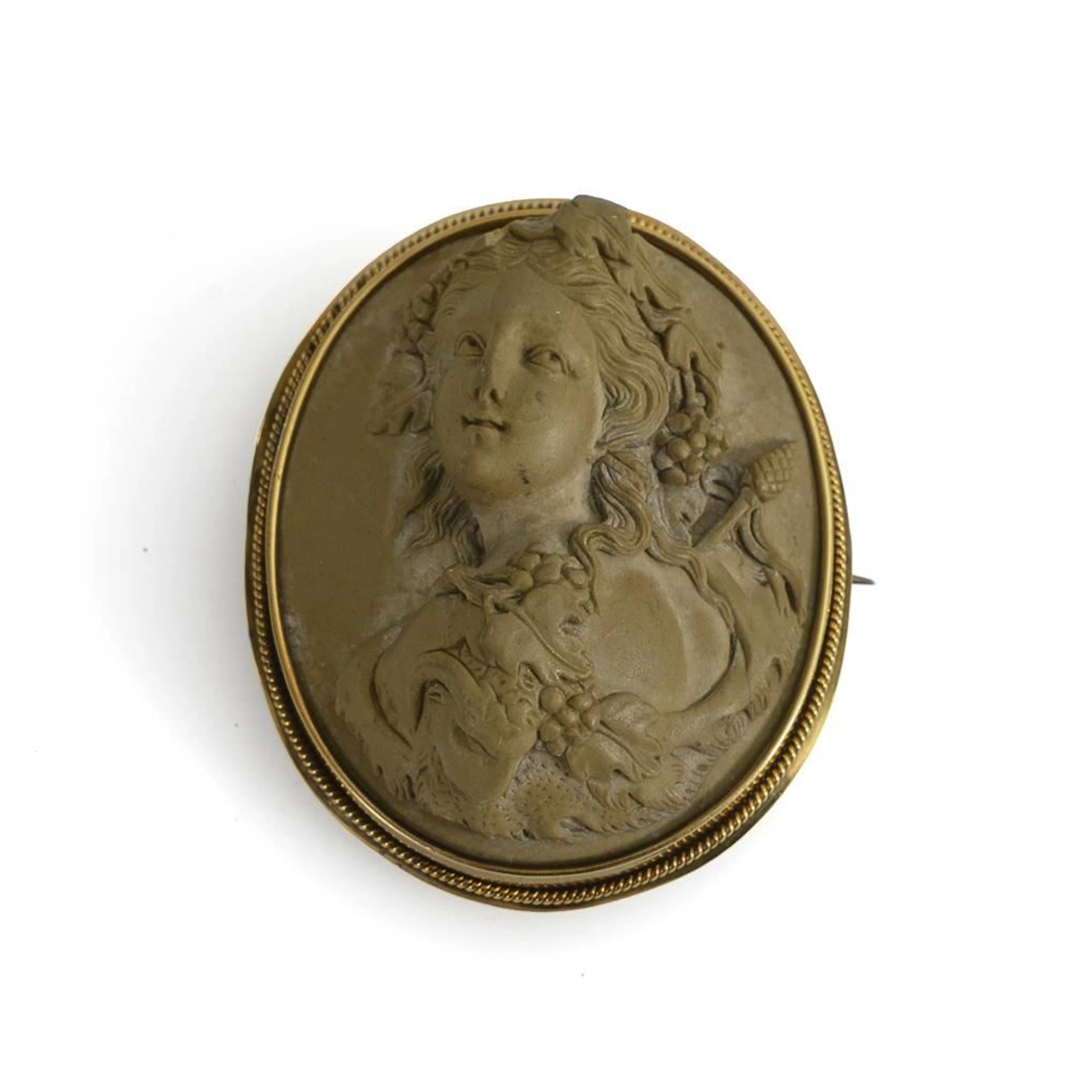 Antique brooch with a lava stone cameo.