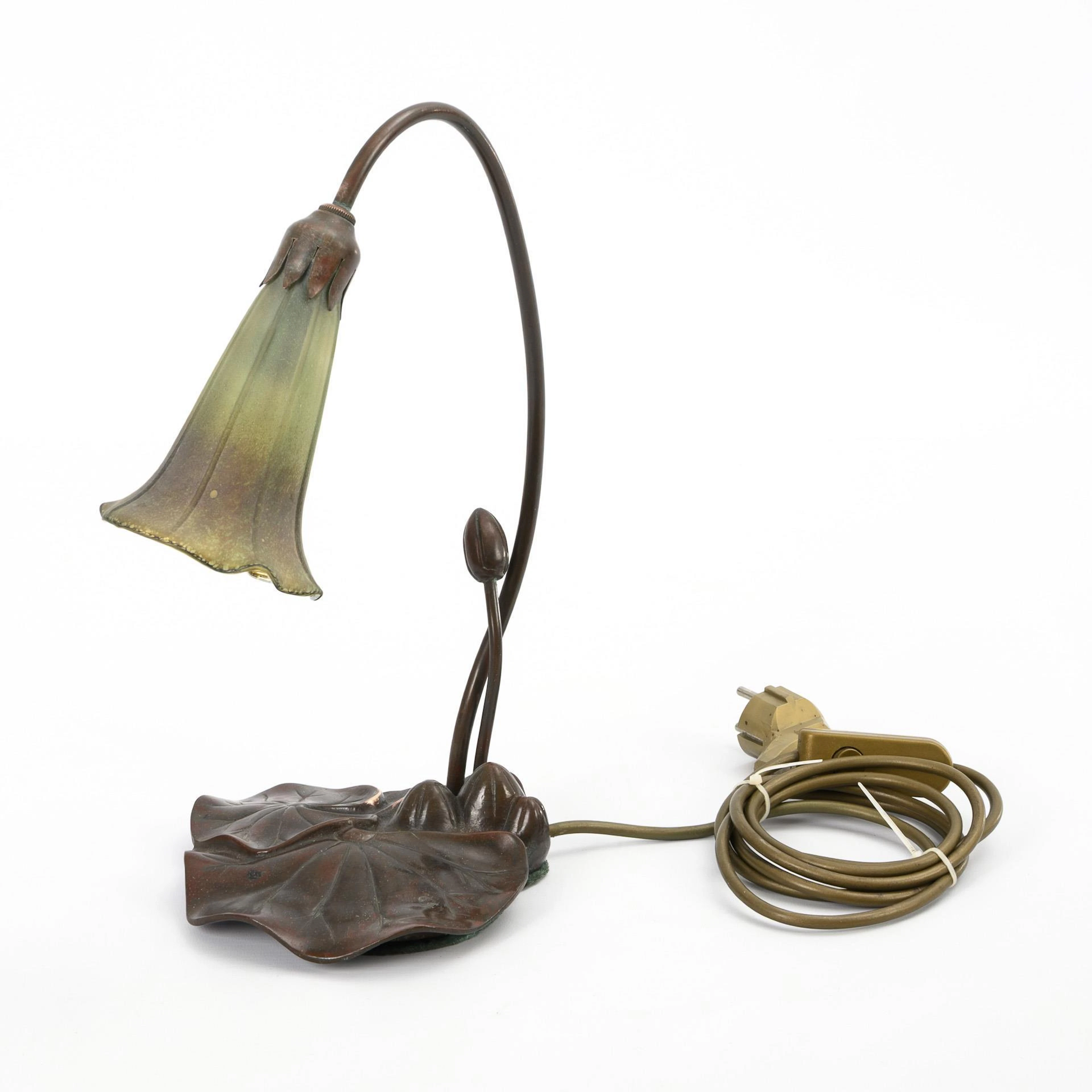 Slim table lamp in Tiffany style.