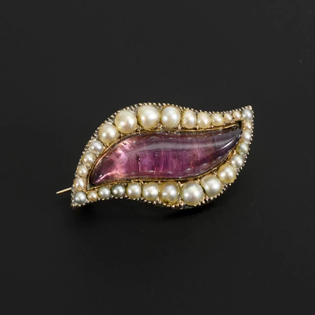Antique brooch with glass paste.