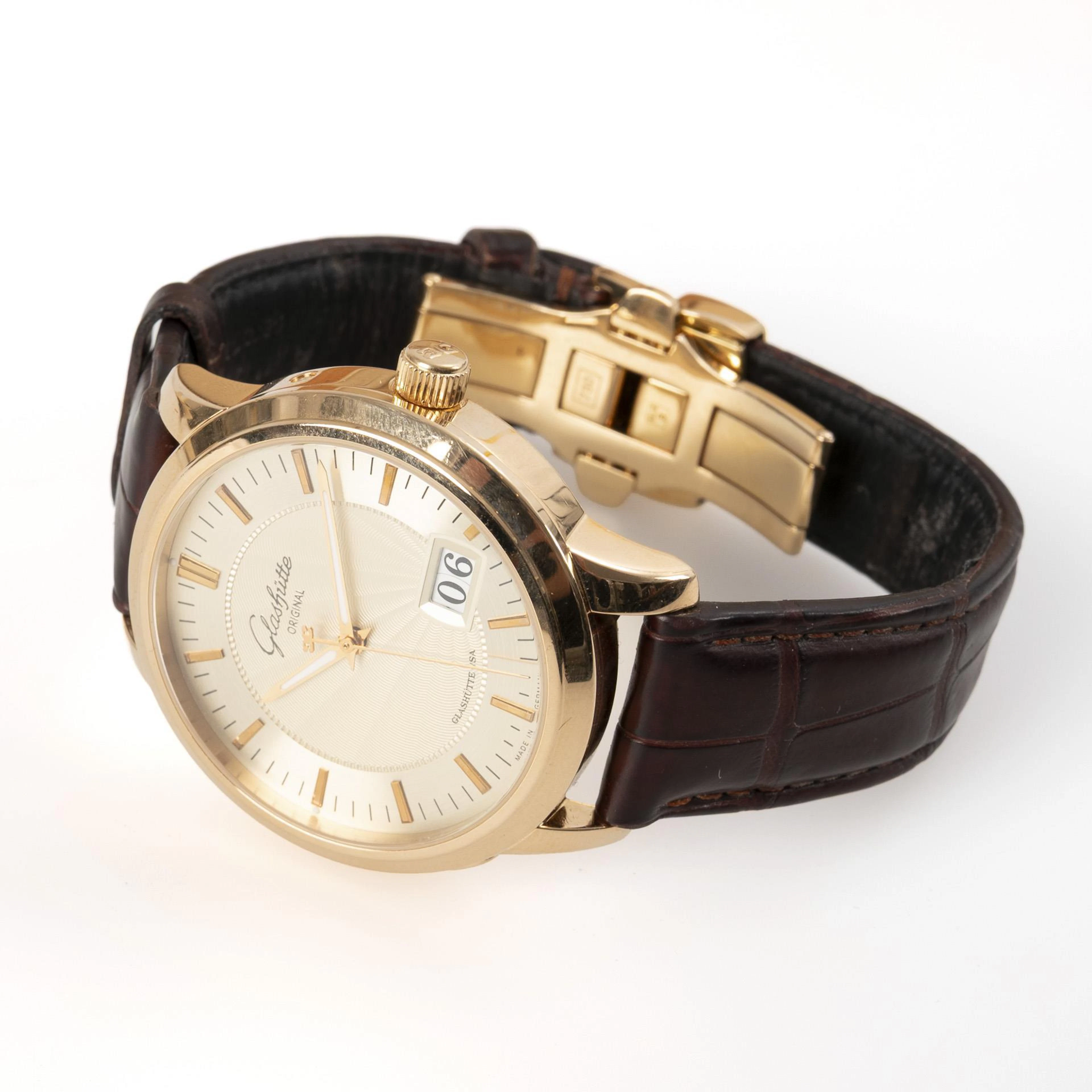 Golden automatic wristwatch "Senator" with panorama date, in original