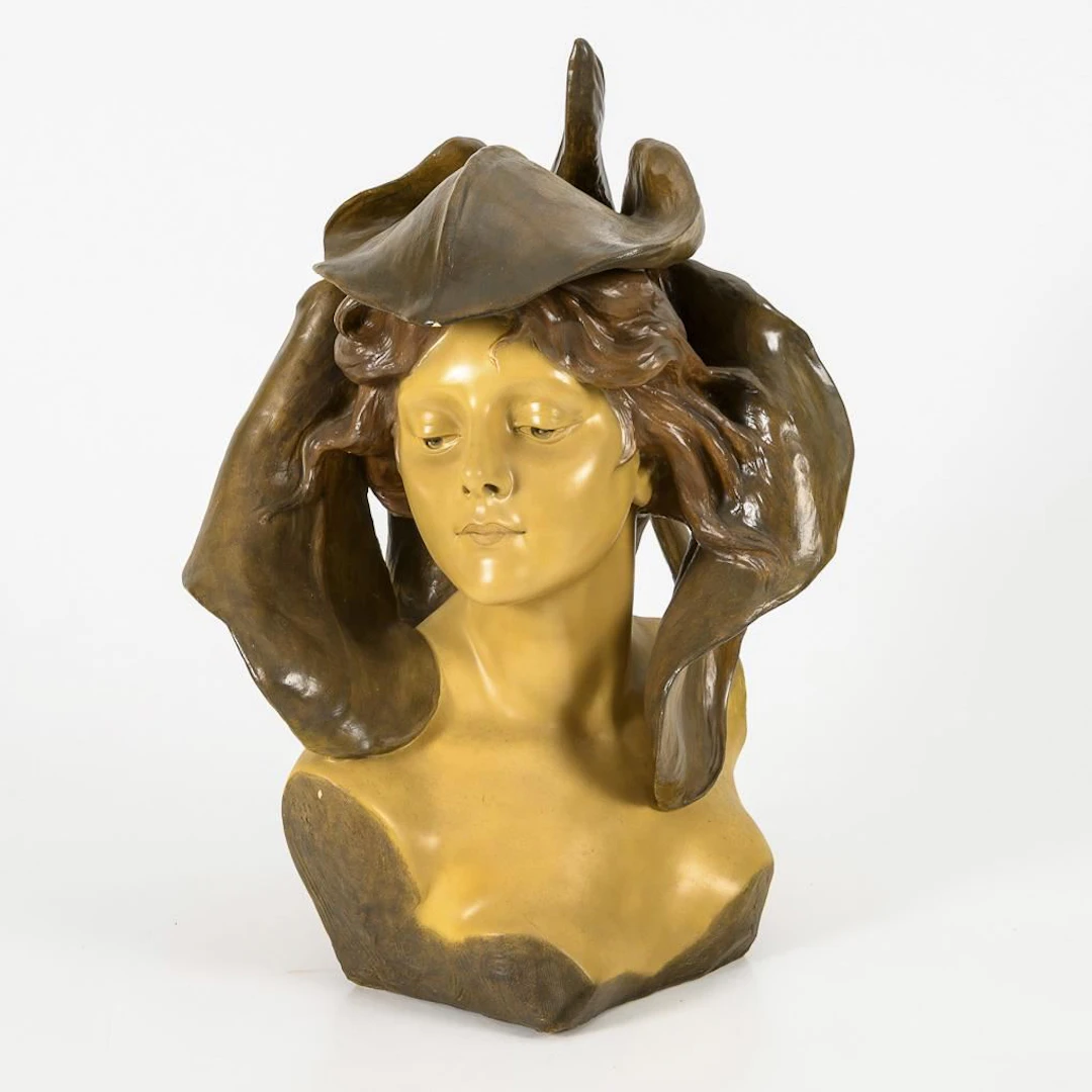 Bust of a young woman with large leaves. Probably made by the Viennese