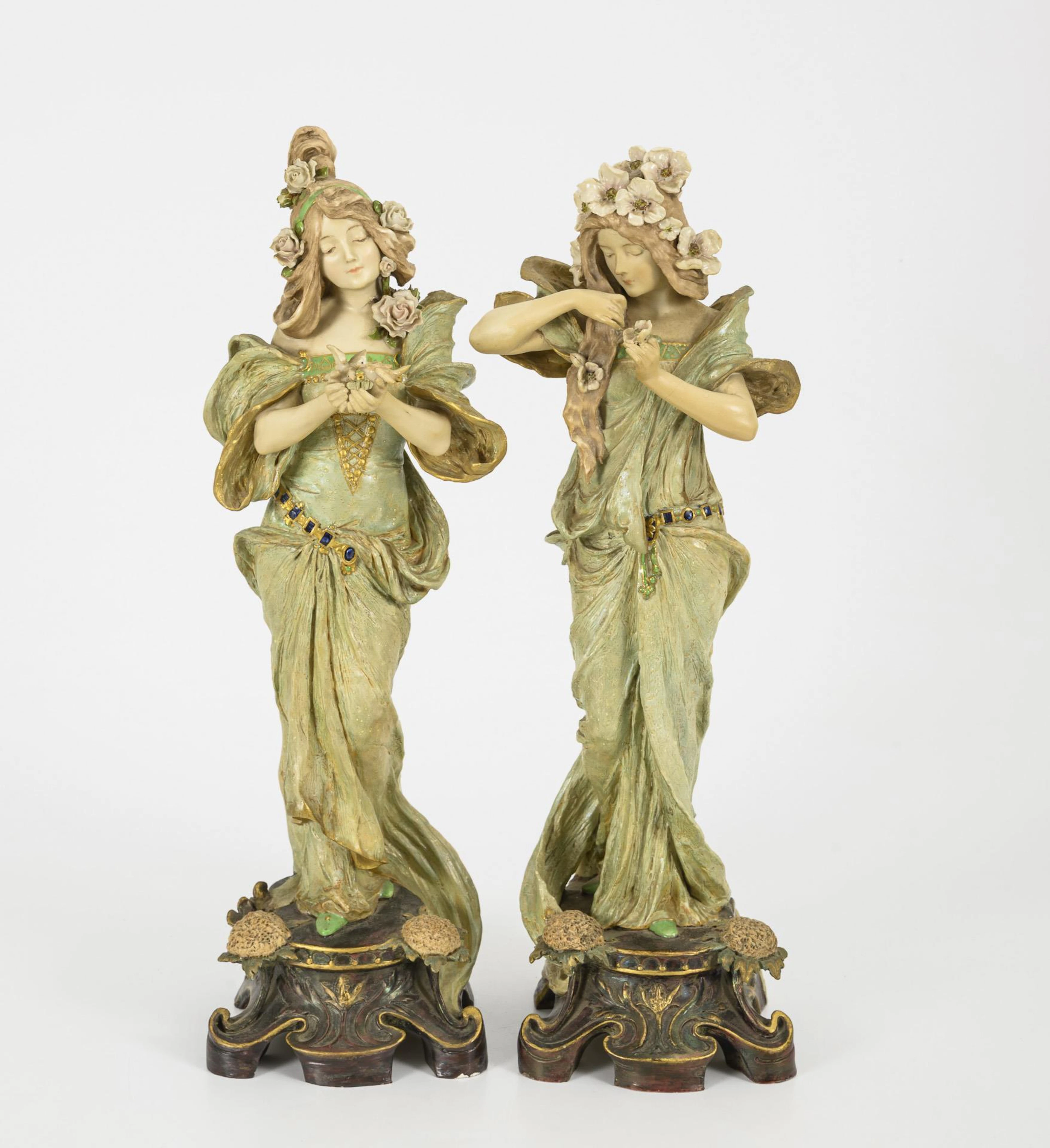 2 Art Nouveau female figures with flower decorations. Ernst Wahliss, Vienna.