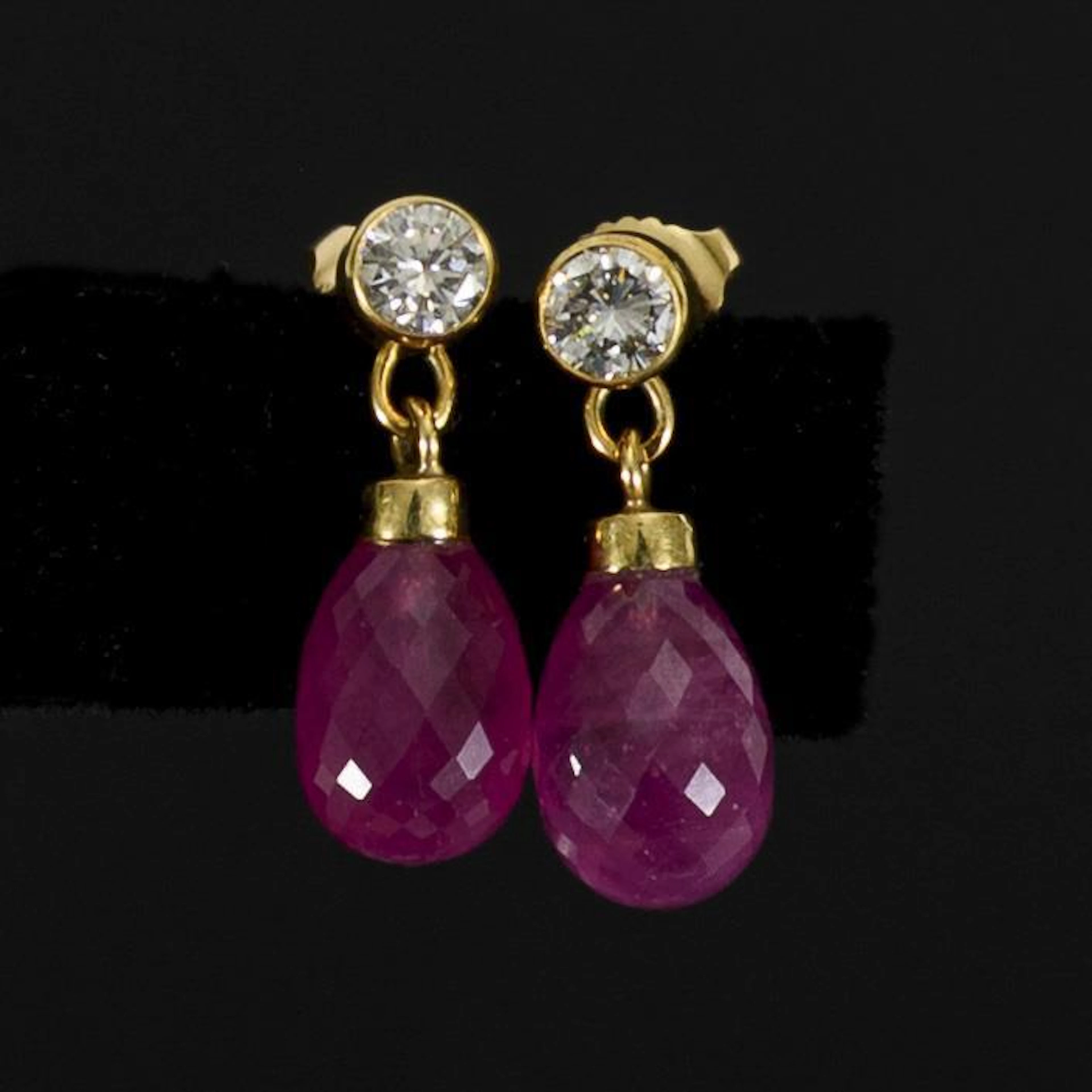 Pair of Jour-et-Nuit earrings with diamonds and rubies.